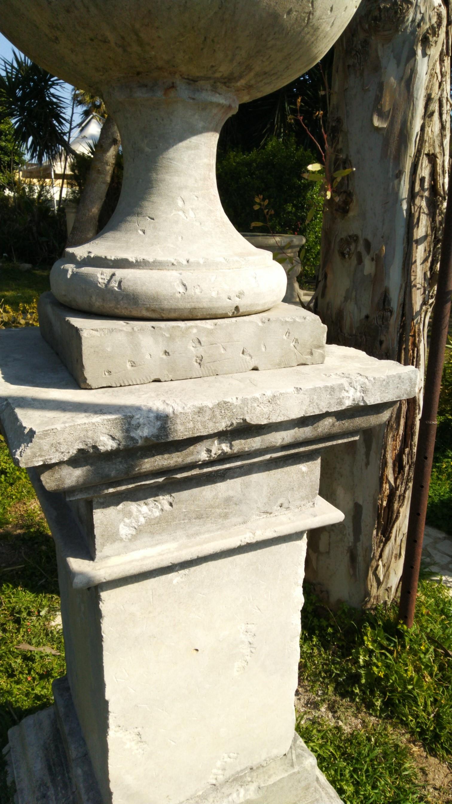 20th Century French Urns with Pedestals 'Pair' Hand-carved in Pure Limestone, antique finish. For Sale