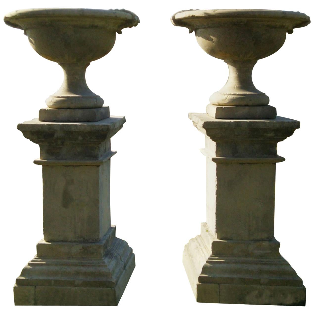 French Urns with Pedestals 'Pair' Hand-carved in Pure Limestone, antique finish. For Sale