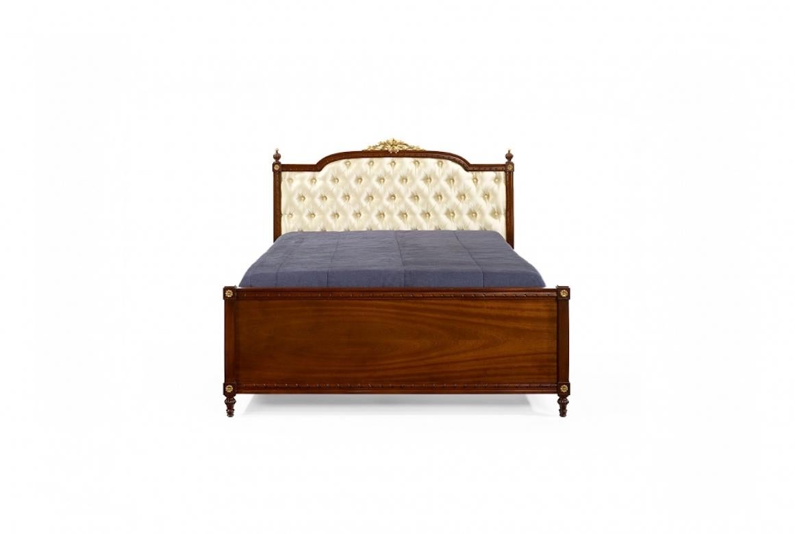 A stunning French Valentin bed frame, 20th century.

The Valentin bed is shown in mahogany wood with a light mahogany finish and details in gold leaf. Note the exquisite hand carved detailing throughout the frame. Details in gold and silver leaf