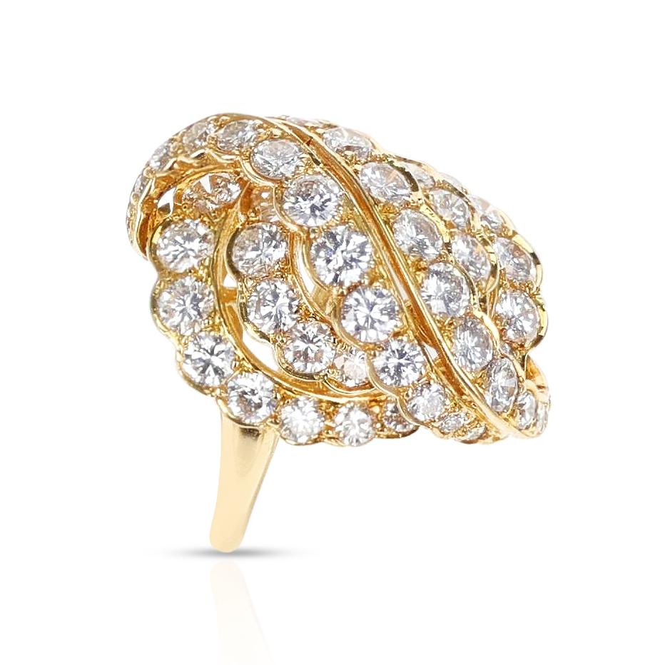 A French Van Cleef & Arpels Diamond Cocktail Ring made in 18 Karat Yellow Gold. The diamonds weigh appx. 6 carats. Made in France. Ring Size US 5. 

SKU 1126


