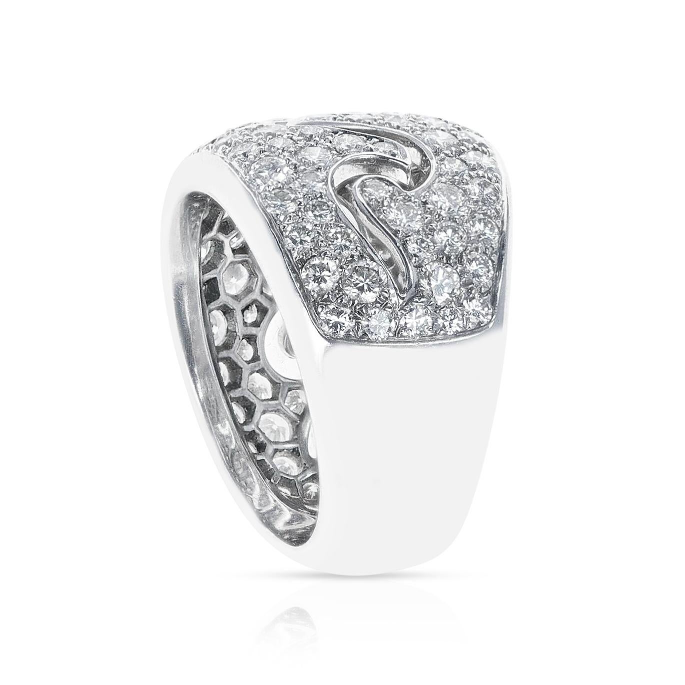 A French Van Cleef & Arpels Diamond Wave Ring made in 18k White Gold. The ring size is 5.75 US.  

SKU 545