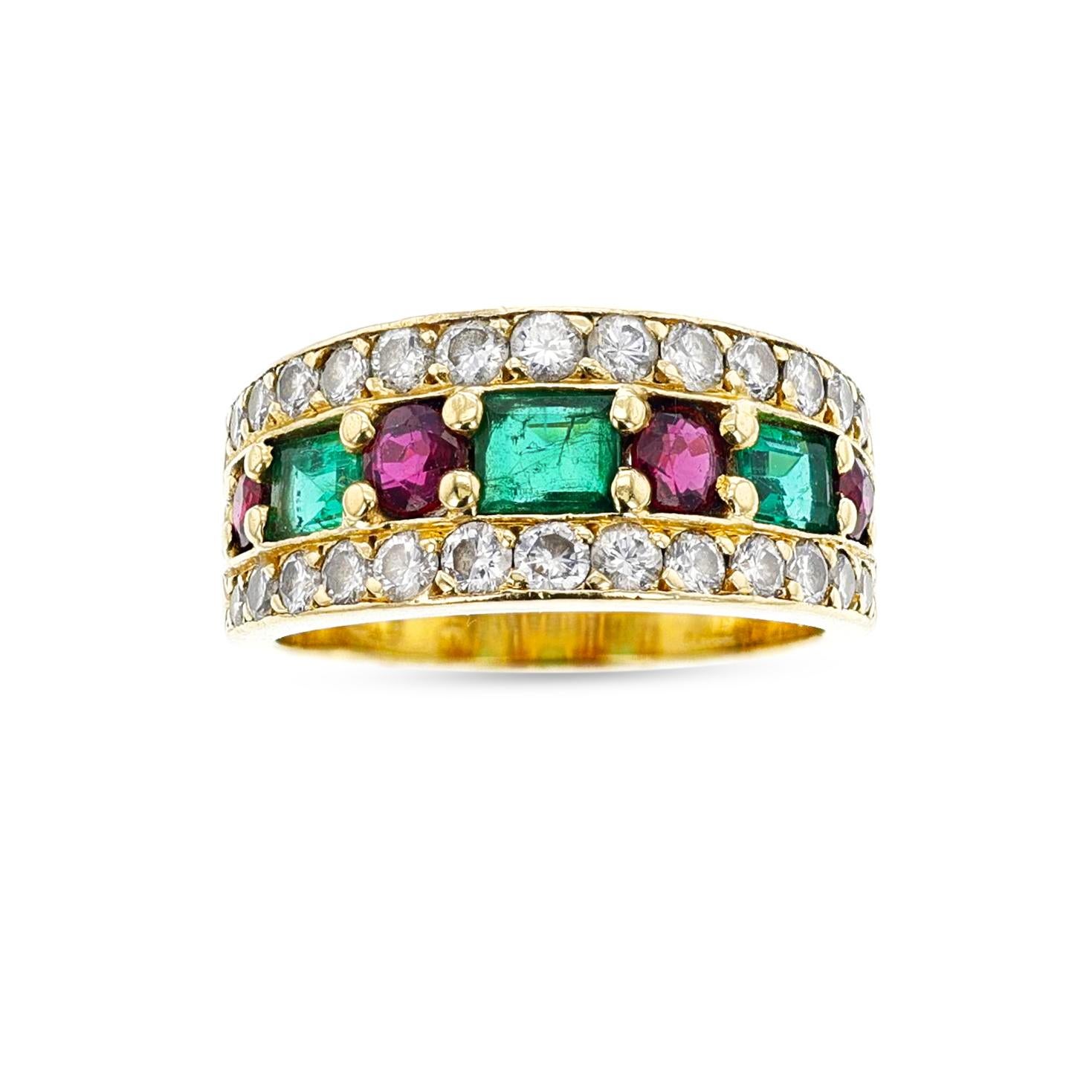 A beautiful emerald, ruby, and diamond yellow gold ring by Van Cleef & Arpels. The ring is set with three rectangular step-cut emeralds, round mixed-cut rubies, and round brilliant-cut diamonds, set in 18k yellow gold. The ring is engraved “VCA” and