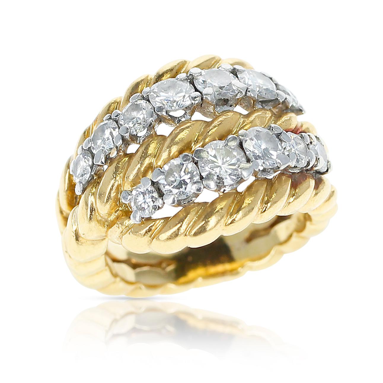 A Van Cleef & Arpels Two Row Diamonds and Twisted Rope Gold Ring made in 18 Karat Yellow Gold. Stamped VCA and Made in France. Ring Size US 3. 
Total Weight: 9.93 grams. 


