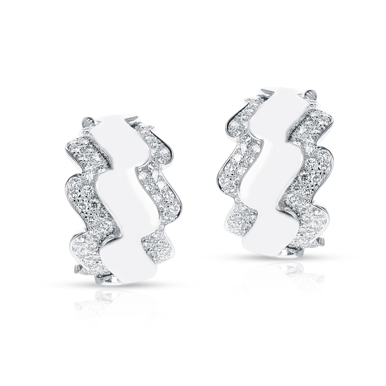 A pair of French Van Cleef & Arpels Wave-Style Earrings made in 18 Karat White Gold with Diamonds. The total weight of the earring is 25.16 grams.
The length is 0.80 inches.
