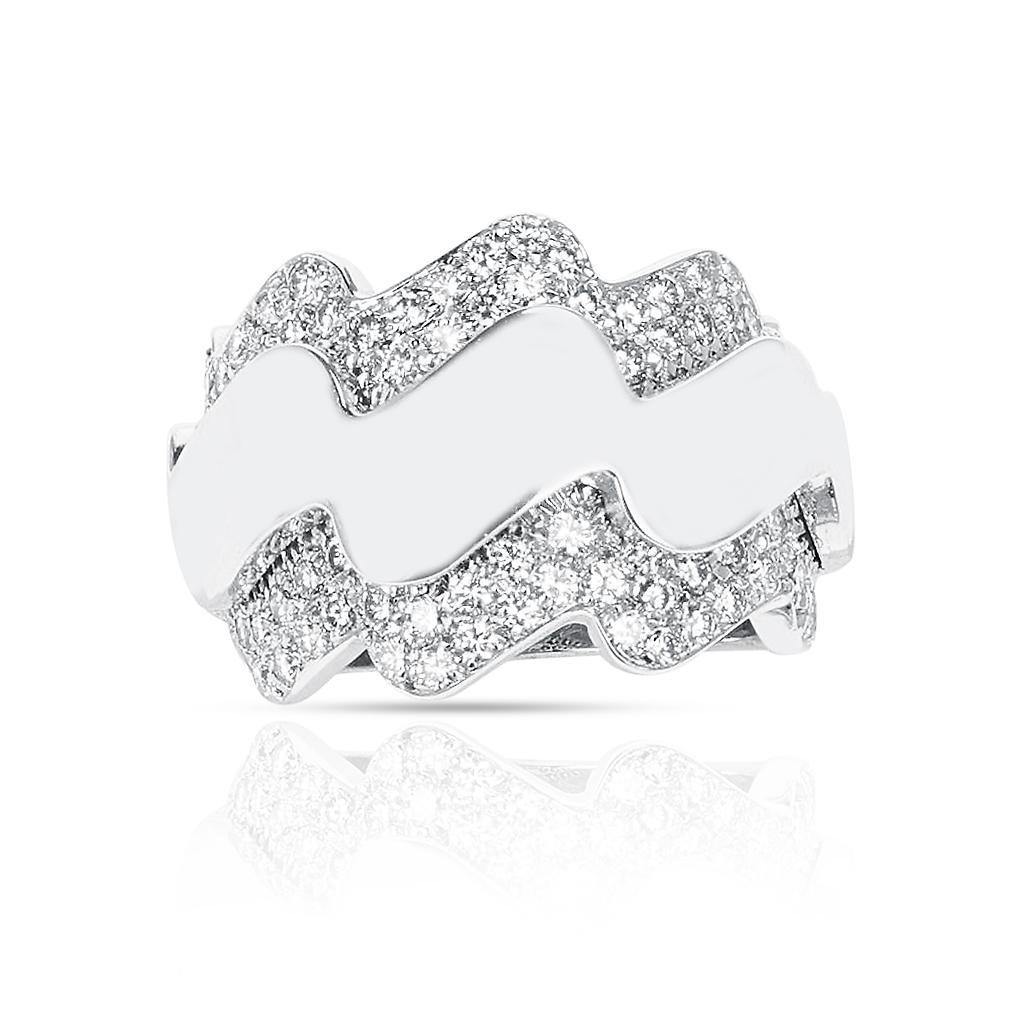 A bold and beautiful French Van Cleef & Arpels Wave-Style Ring with Diamonds made in 18 Karat White Gold. The total weight is 14.91 grams. The Ring Size US 4.50. 