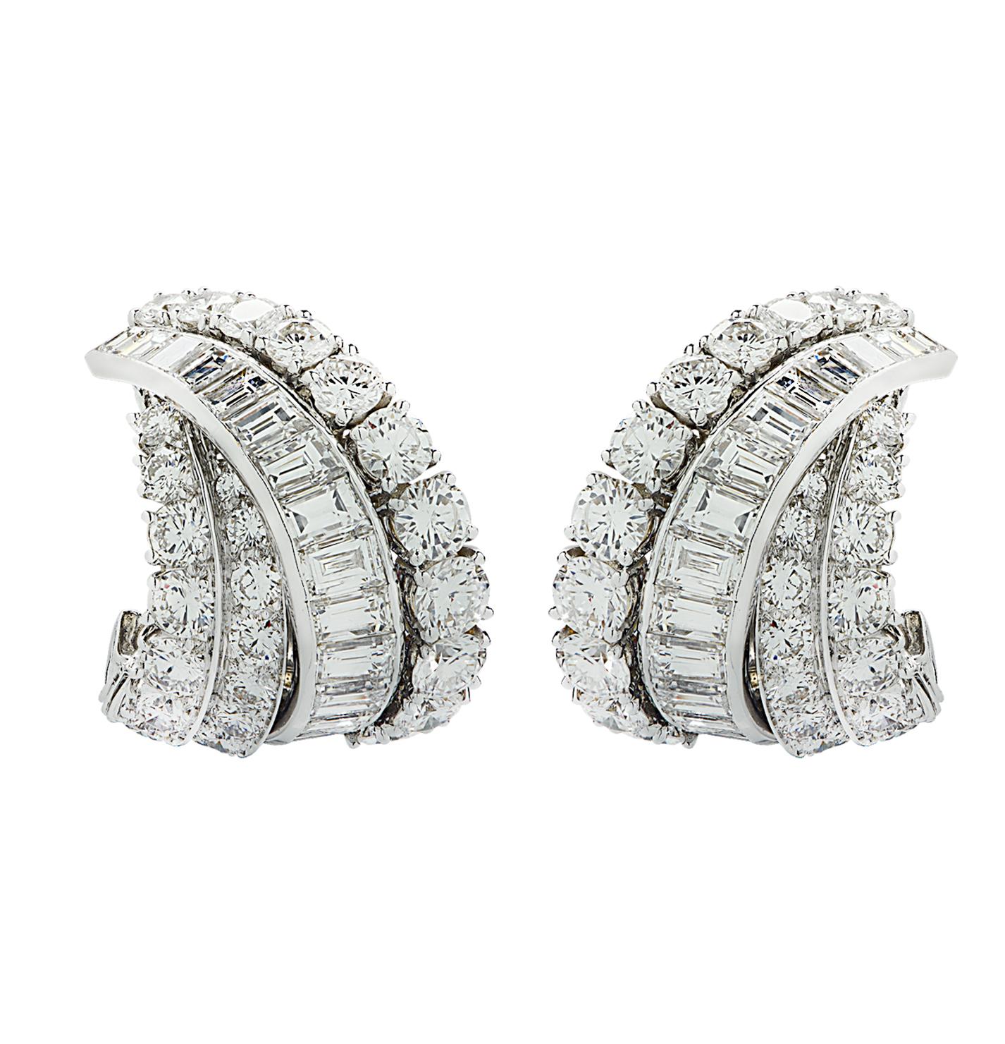 Hailing from the prestigious French Maison of Van Cleef & Arpels, these circa 1970 earrings are a testament to timeless elegance and the artistry of fine jewelry making. Each earring is masterfully crafted from 18k white gold

 

The design features