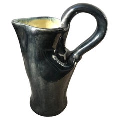 French vase, black outside yellow inside