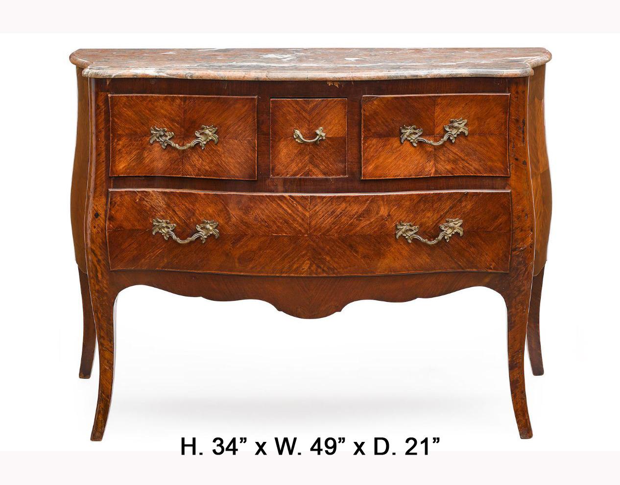Lovely French Louis XV style veneered commode with marble top. 
19th century. 
A moulded serpentine-fronted marble top is over three short drawers and one long drawer mounted with foliate inspired bronze handles, above a shaped carved apron,
