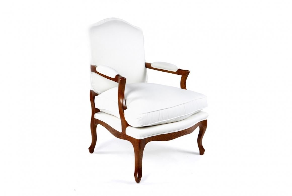 A stunning French Venice fauteuil Louis XV armchair, 20th century.

The Venice fauteuil is shown in cherrywood with an Avignon finish. The Venice bergère is a Louis XV armchair with a fixed upholstered back and a loose seat