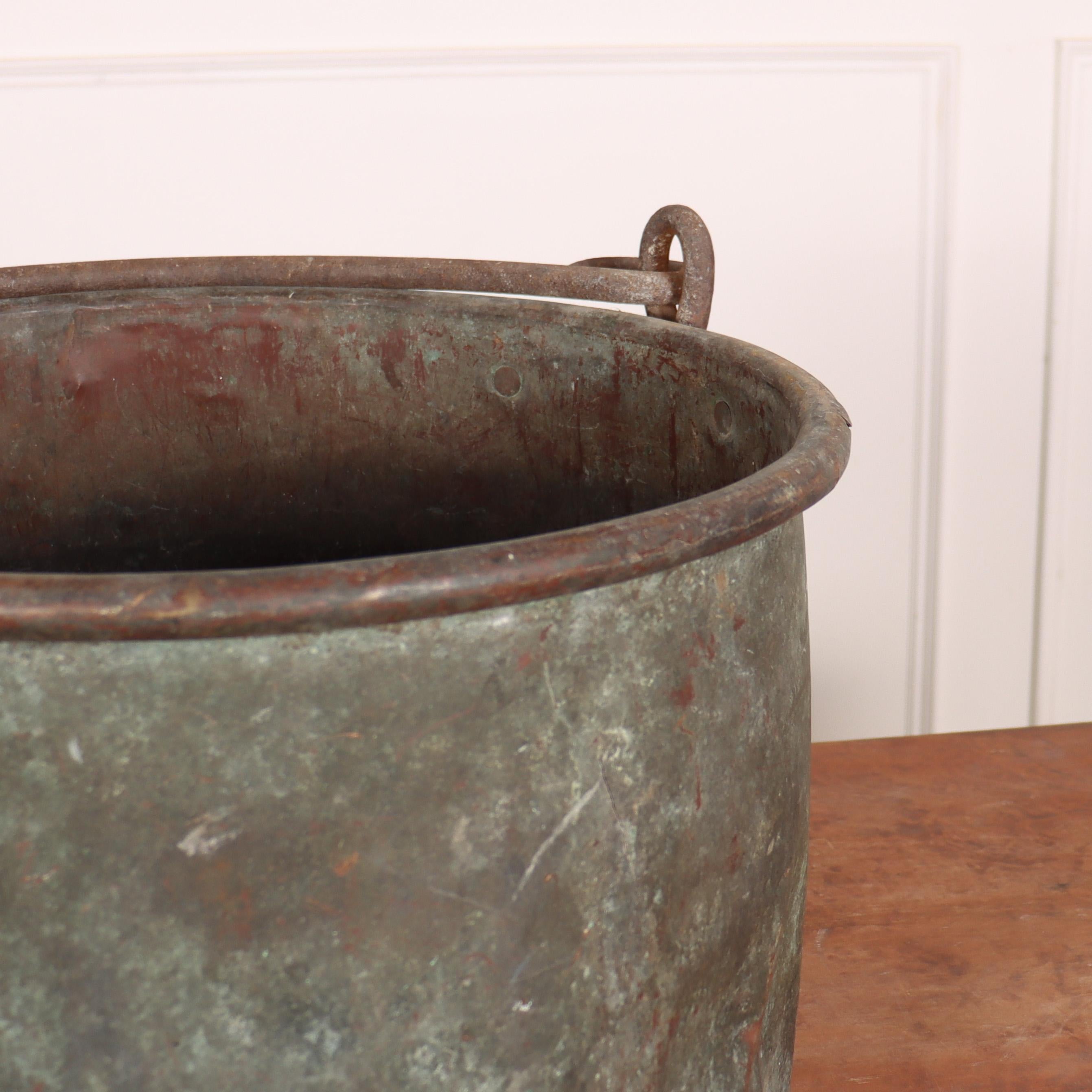 19th C French copper vat with wonderful verdigris patina.

Reference: 7989

Dimensions
13.5 inches (34 cms) High
21 inches (53 cms) Diameter