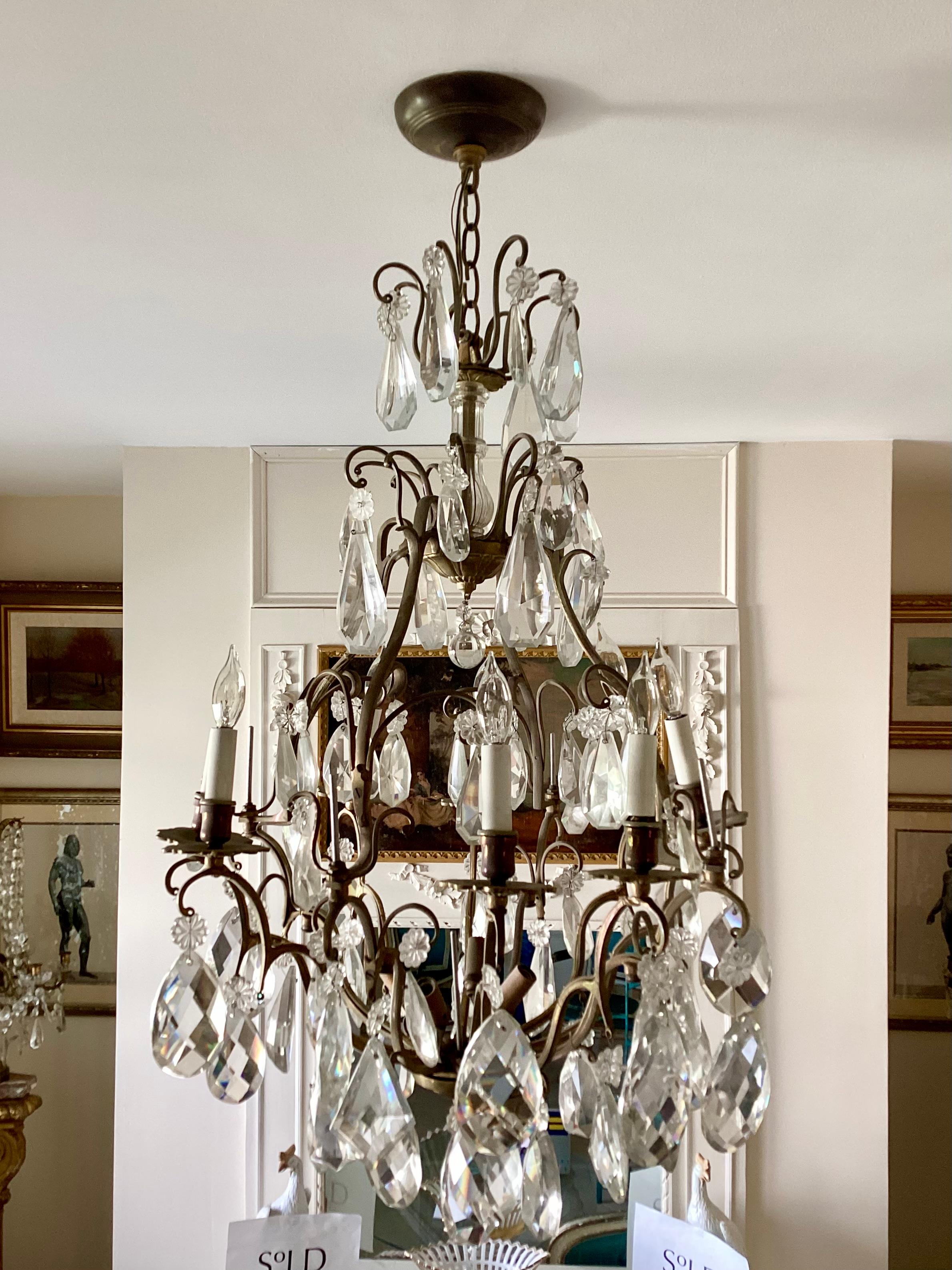 Bronze French Versailles chandelier. Missing pieces, so selling as is. Gorgeous bronze frame just a few missing items can easily be found. Selling as is.