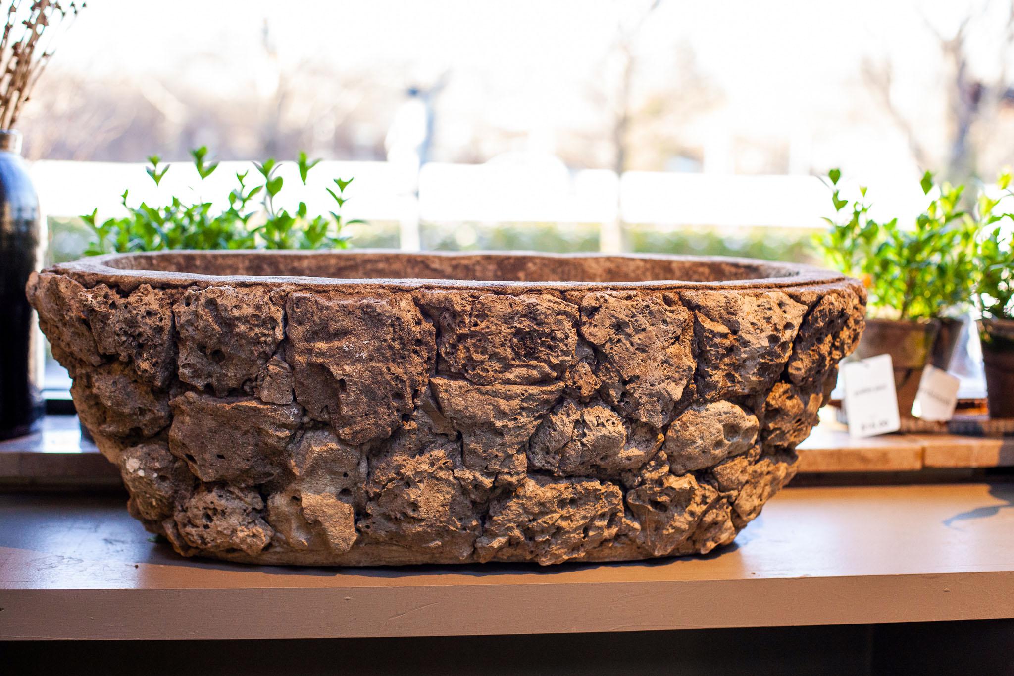 Fleurdetroit presents. for your consideration a pair of stone encrusted planters, reminiscent of the grotto at Versailles. 

A traveler through the twentieth century, this stone trough is sure to delight and add a sense of intrigue to any garden or