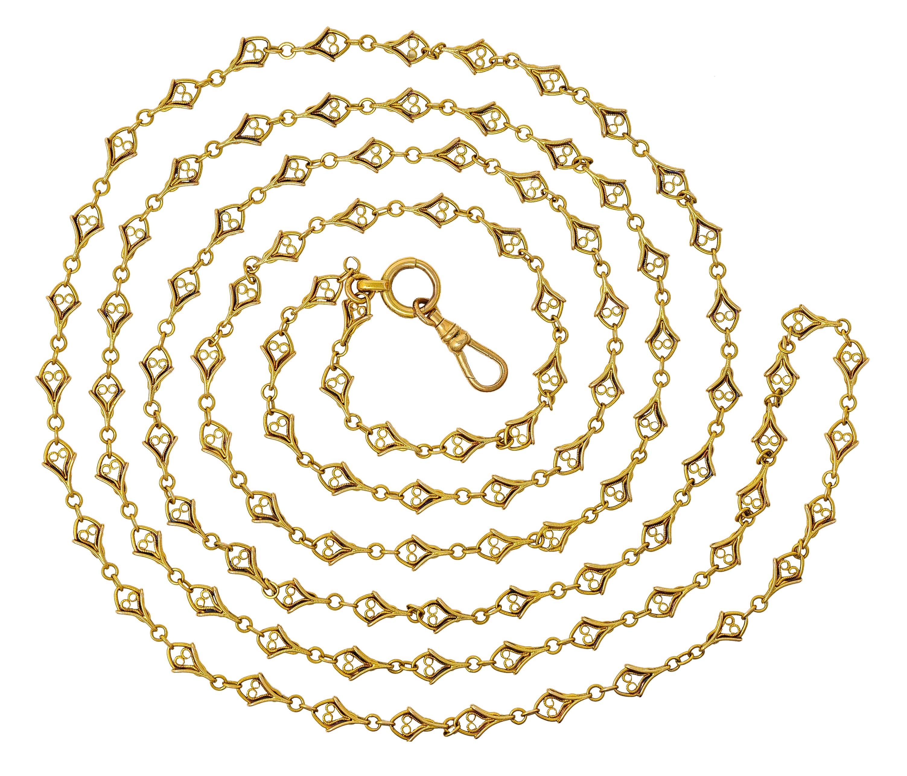 Eternity necklace is comprised of stylized chain links centering filigree heart motifs. With round and oval spacer links. Completed by large spring clasp ring and lobster clasp. Tested with French hallmarks for 18 karat gold. Circa: 1860's. Length: