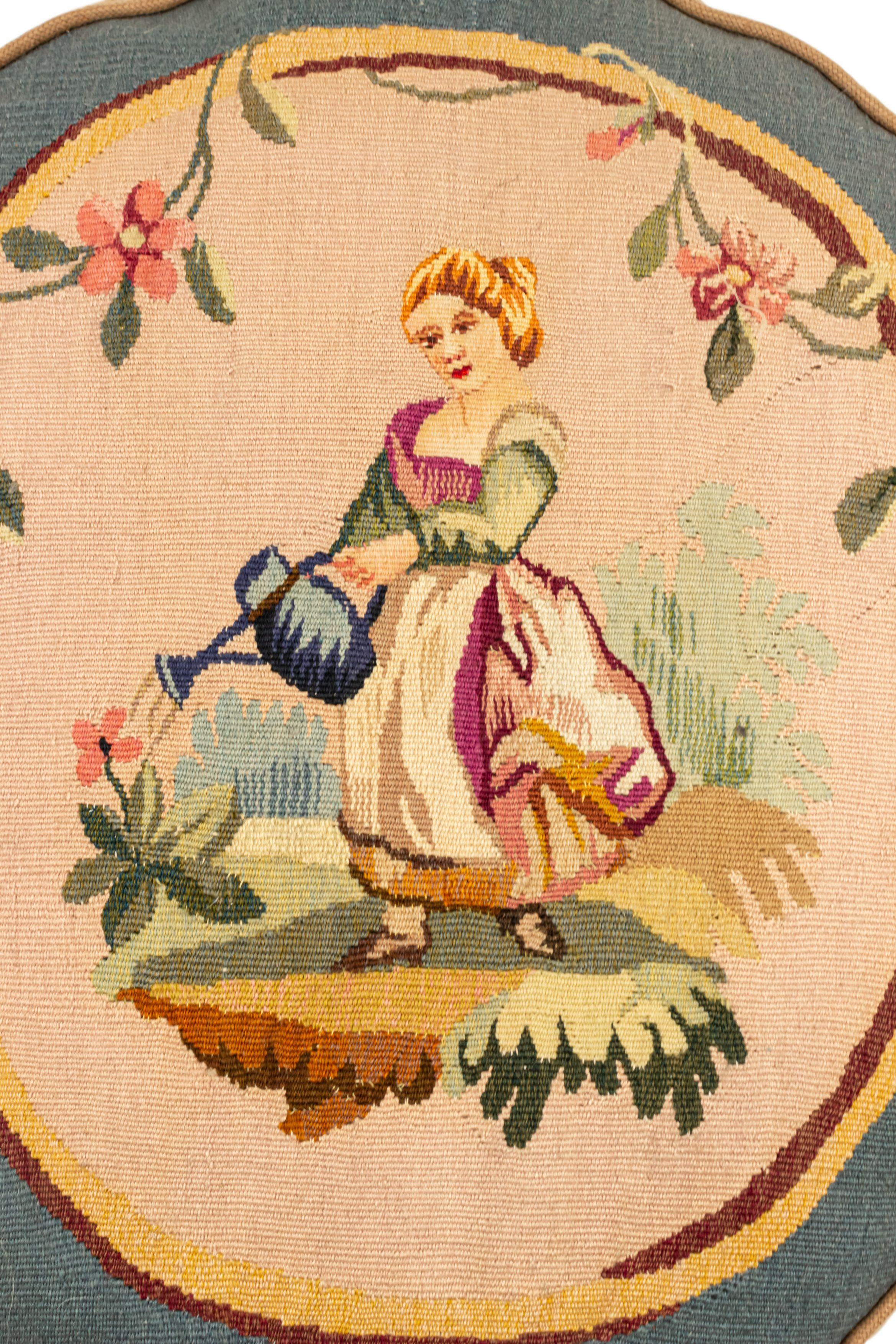 French Victorian Aubusson upholstered double-sided oval cushion with flowers and girls with blue border.
 