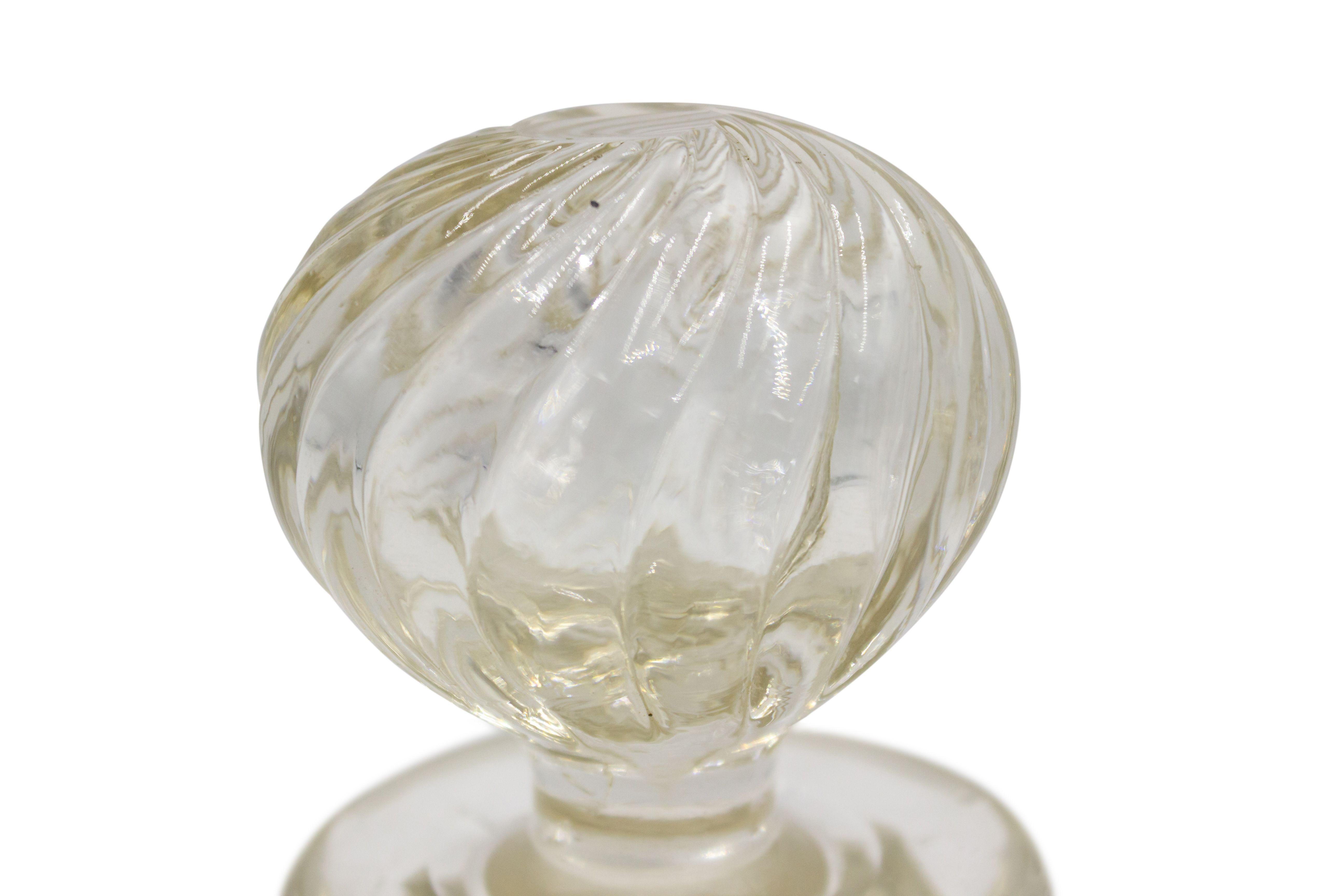 French Victorian Baccarat-style blown glass bulbous shaped swirl design decanter with ball stopper.
 