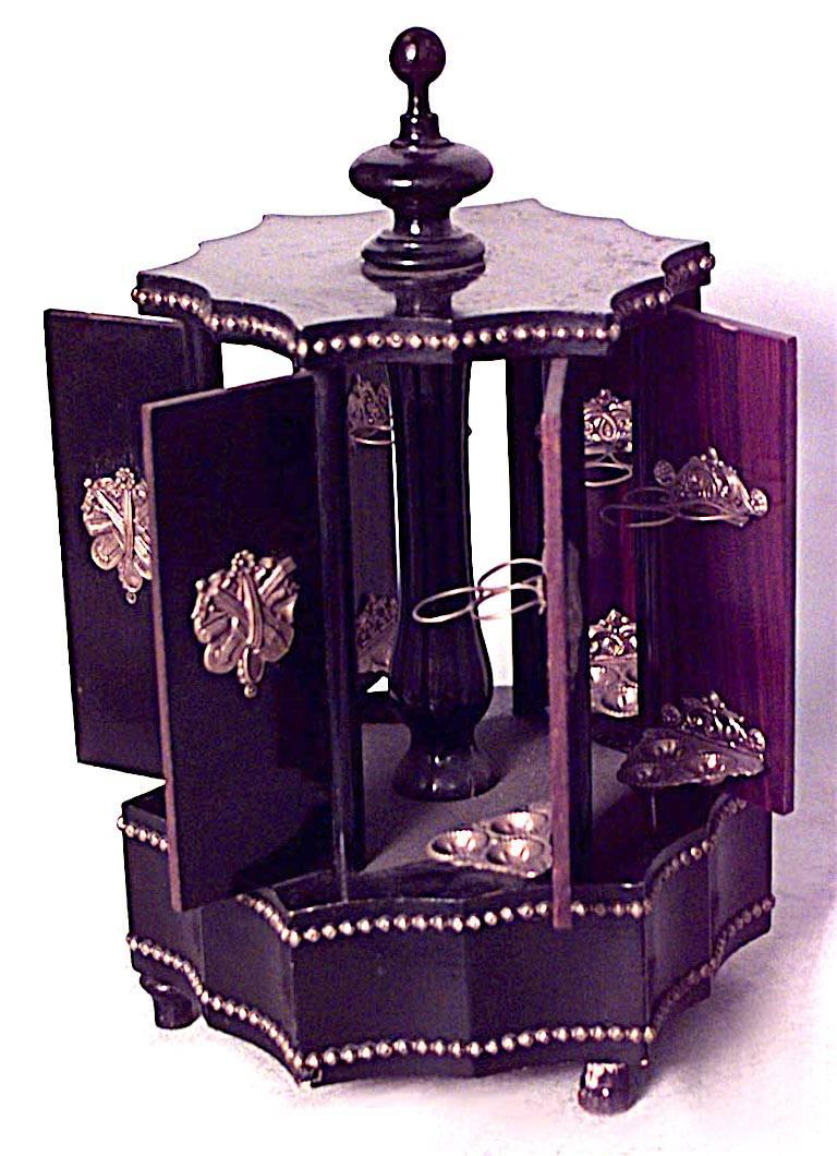 French Victorian black lacquered and bronze trimmed 6 sided cigar holder with music box at base. 52/54 ring gauge, 6.25 length. *One door does no open automatically with the rest. Slight scratches on top knob. Music box not working.
