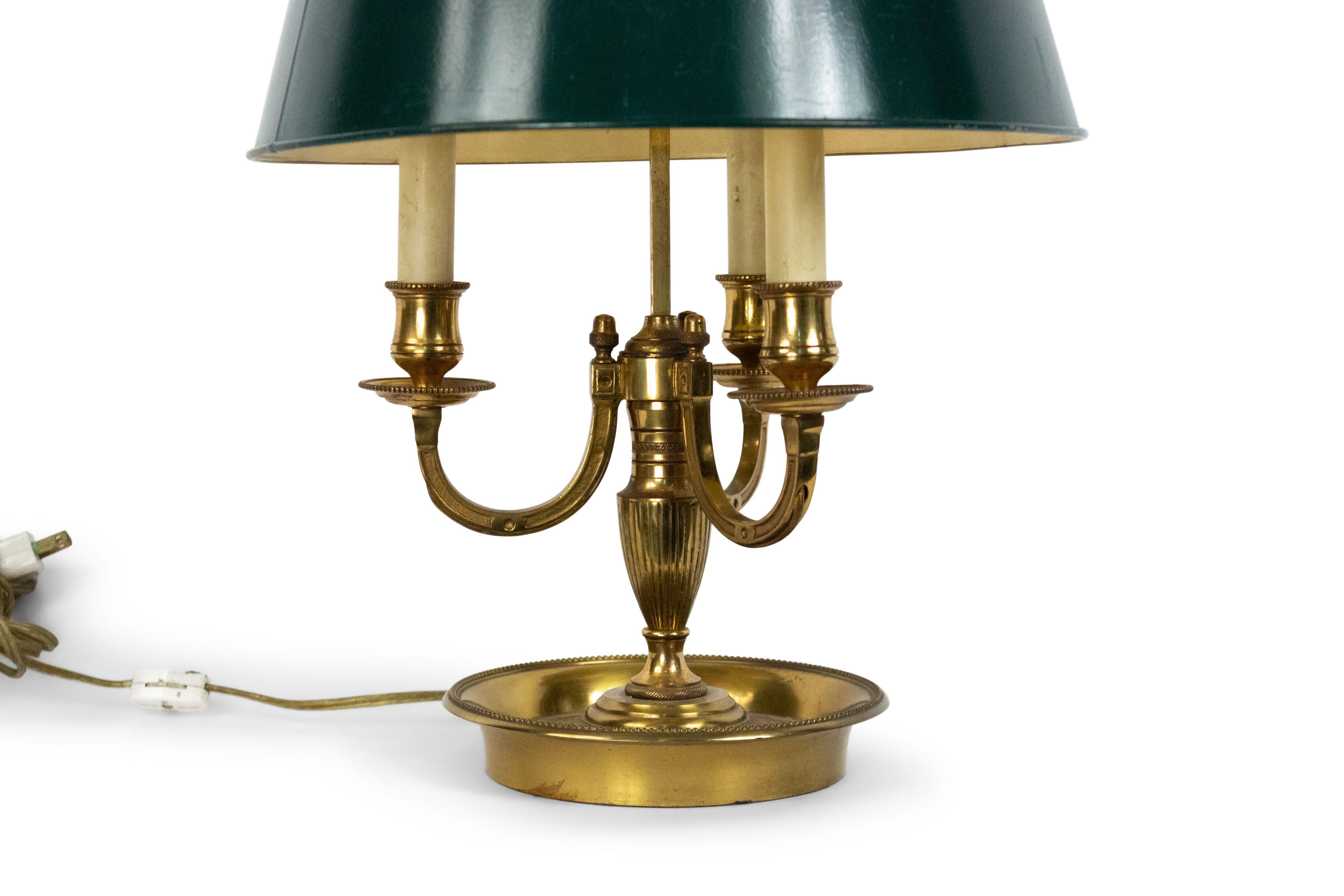 Pair of French Victorian 20th century brass 3-light bouillotte lamps with green painted metal round shades.