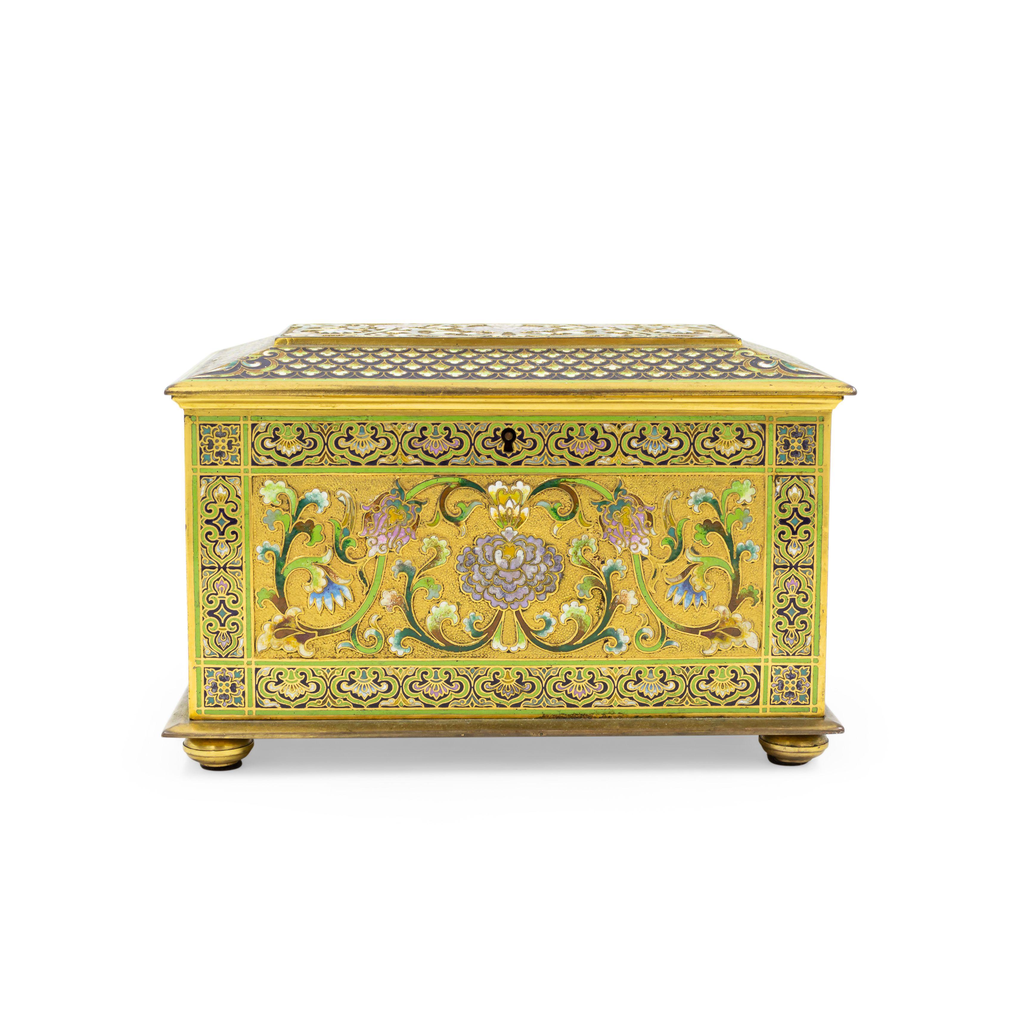 French Victorian bronze and multicolored enamel cloisonne box with floral and scroll design with red velvet interior.
     
