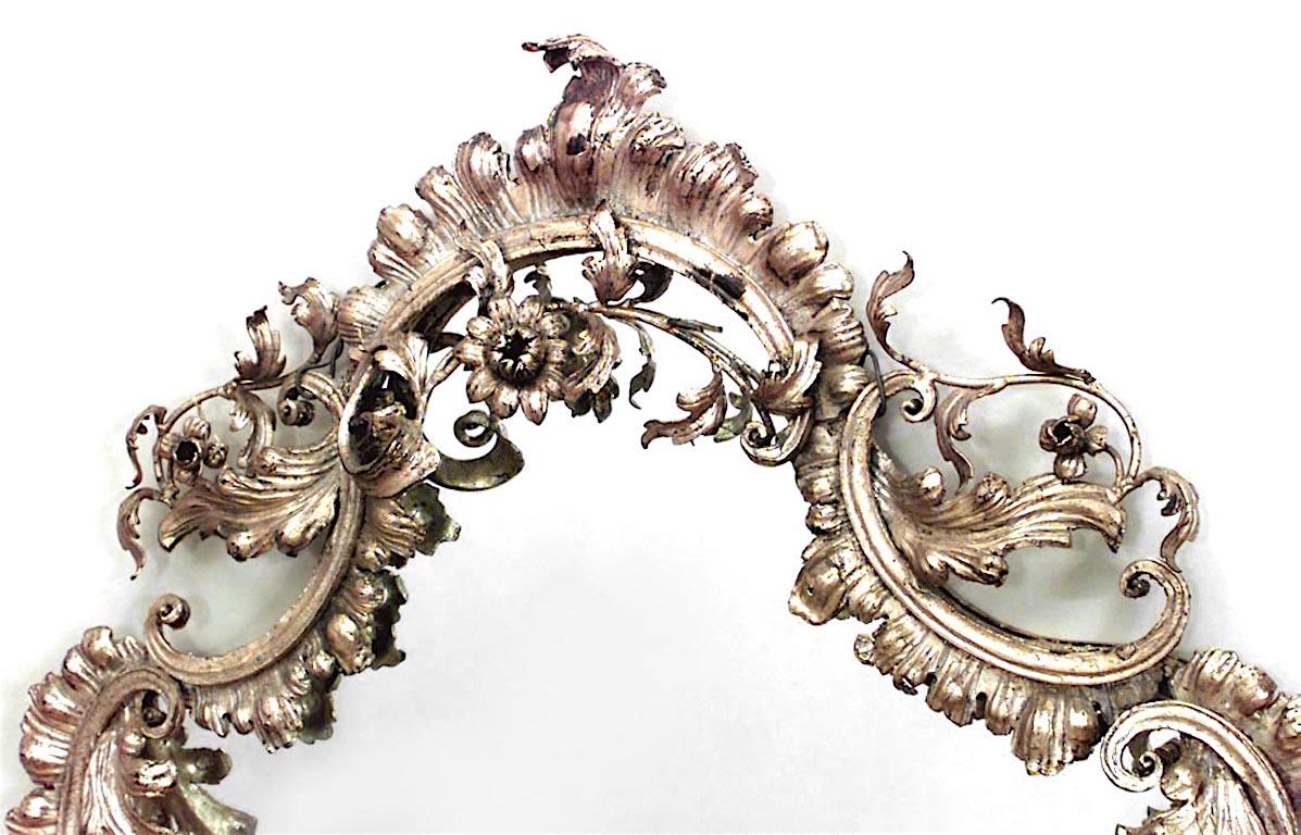 French Victorian (19th Century) vertical shaped bronze dore wall mirror with scroll and floral design.
