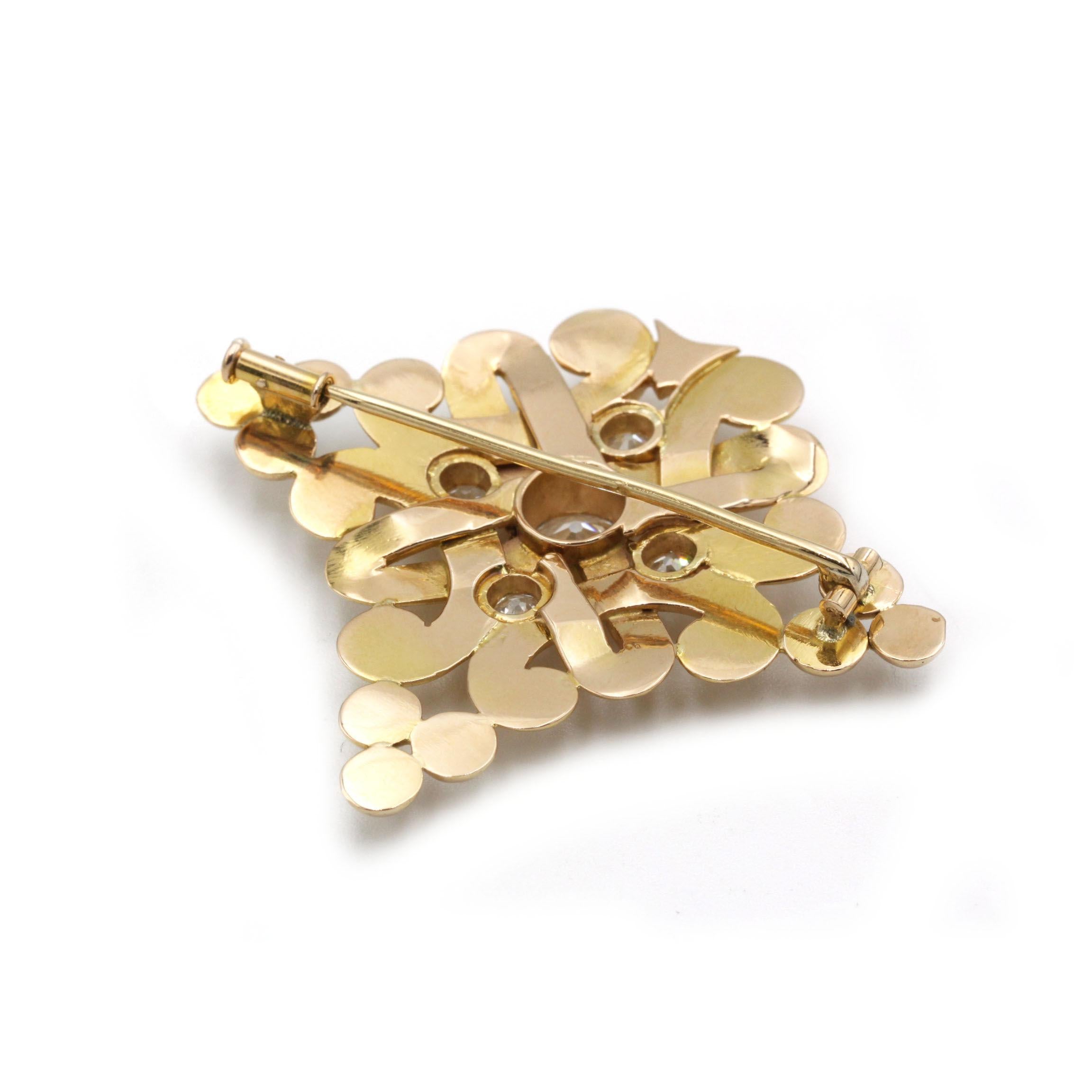A sumptuous example of late-19th-century French craftsmanship, this Victorian brooch is rendered in warm 18 K yellow gold and centered on a 1.20-carat old European-cut diamond. Four smaller old-cut diamonds (approx. 0.70 ct total) nestle into the