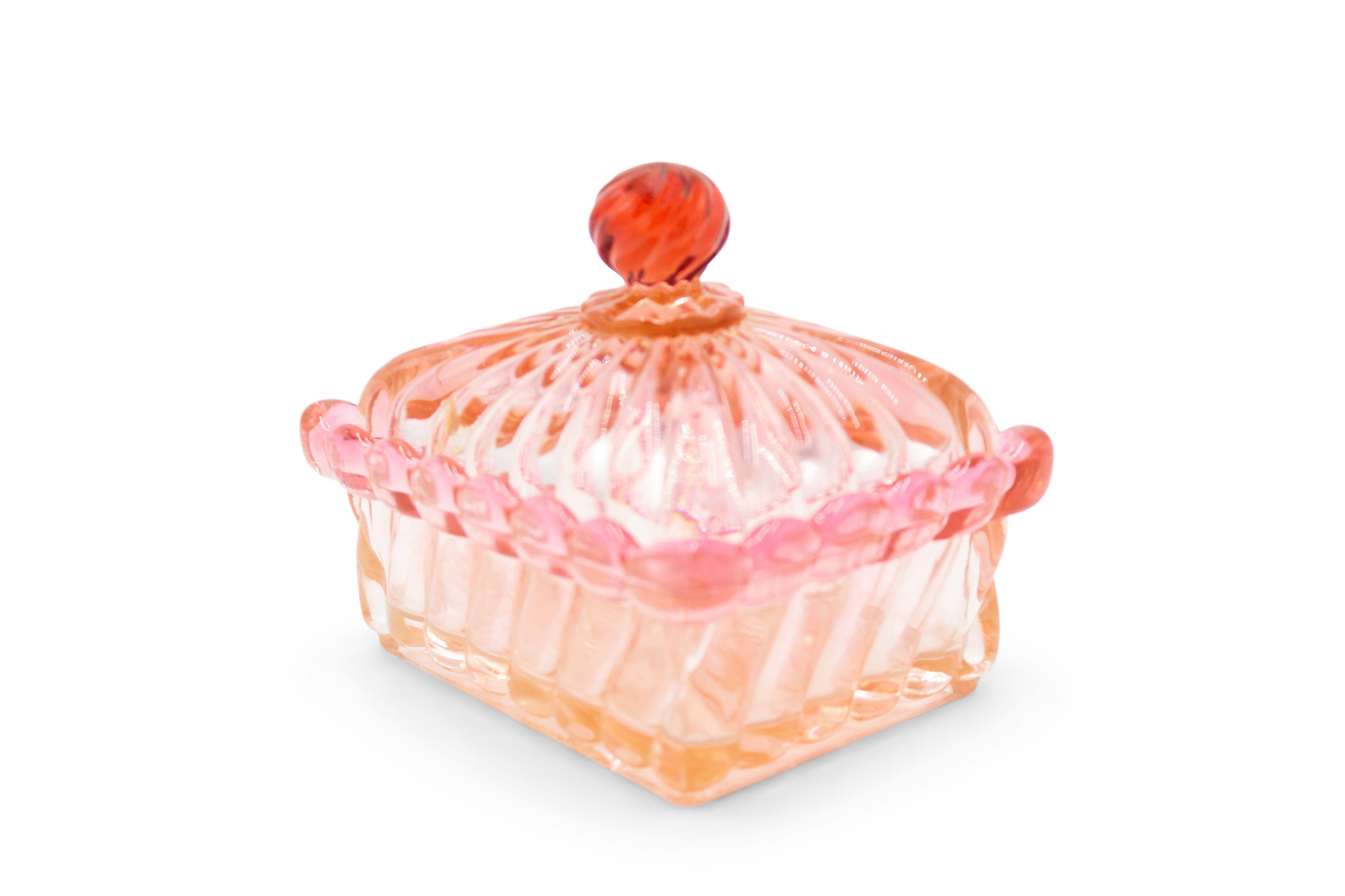 French Victorian cranberry colored crystal rectangular powder box with swirl design.
 