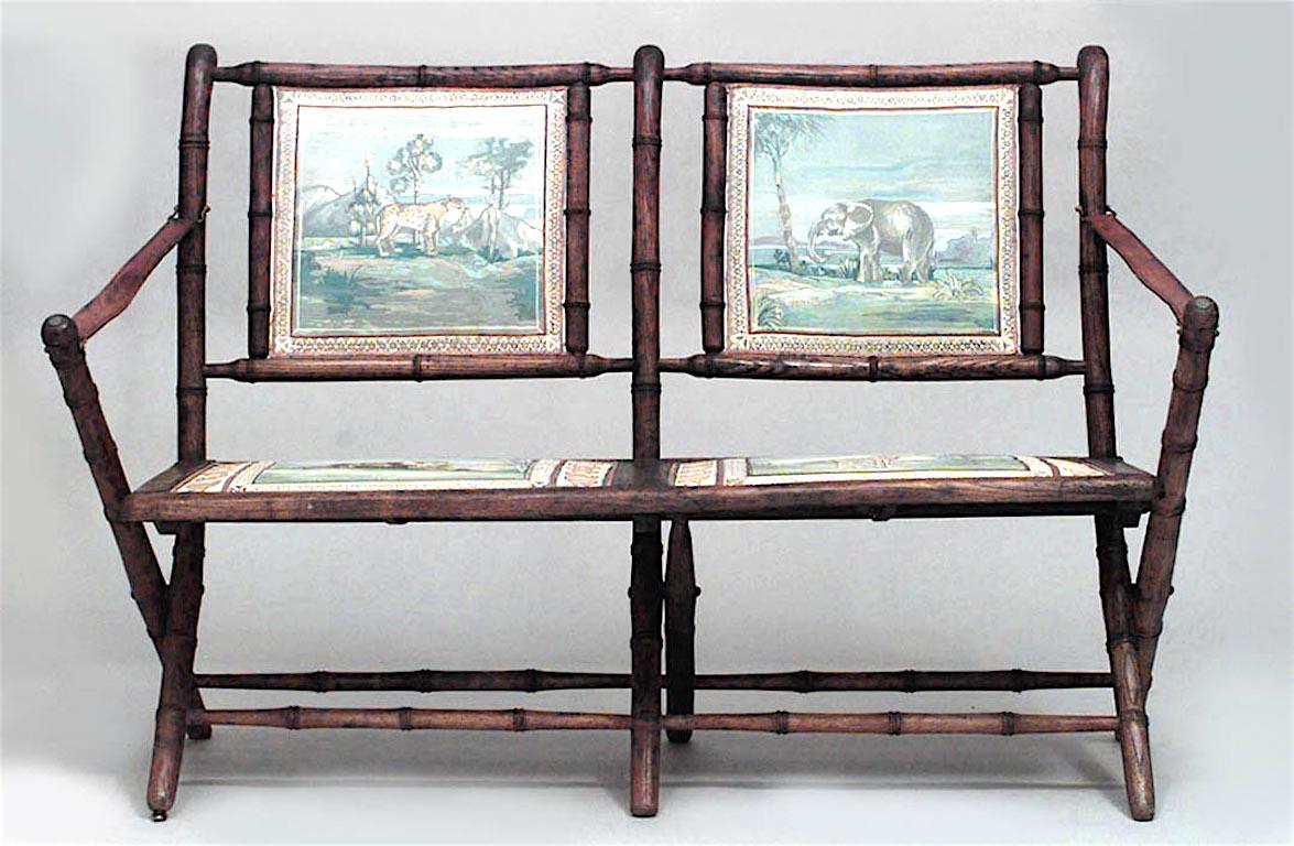 French Victorian oak faux bamboo Campaign design folding loveseat with (recently) painted seat and back panels with animals and leather arm straps (See also: Living room set: 059723A, matching arm: 059724).
 