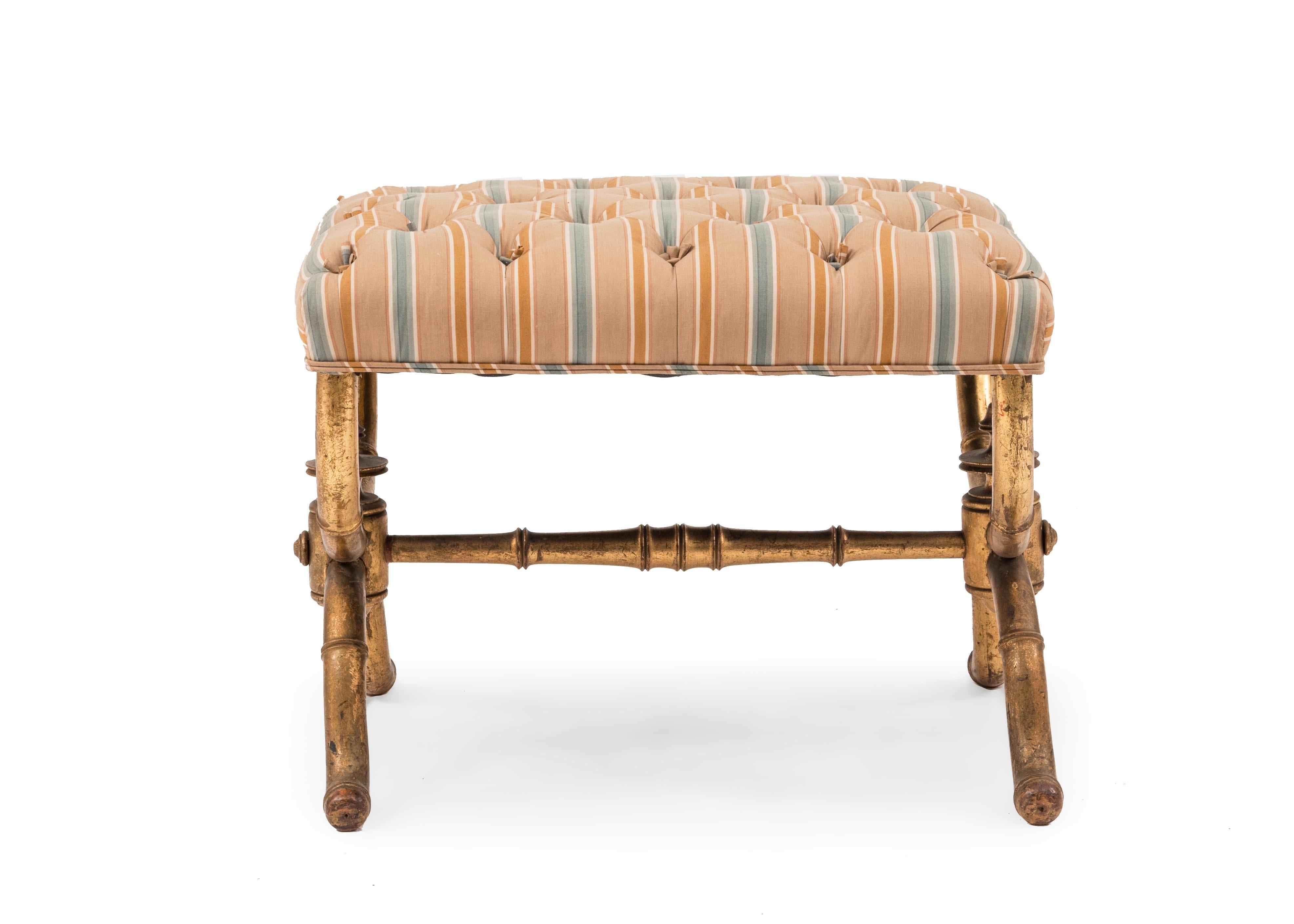 French Victorian gilded faux bamboo cross leg rectangular bench with stretcher and red and beige floral seat.
   