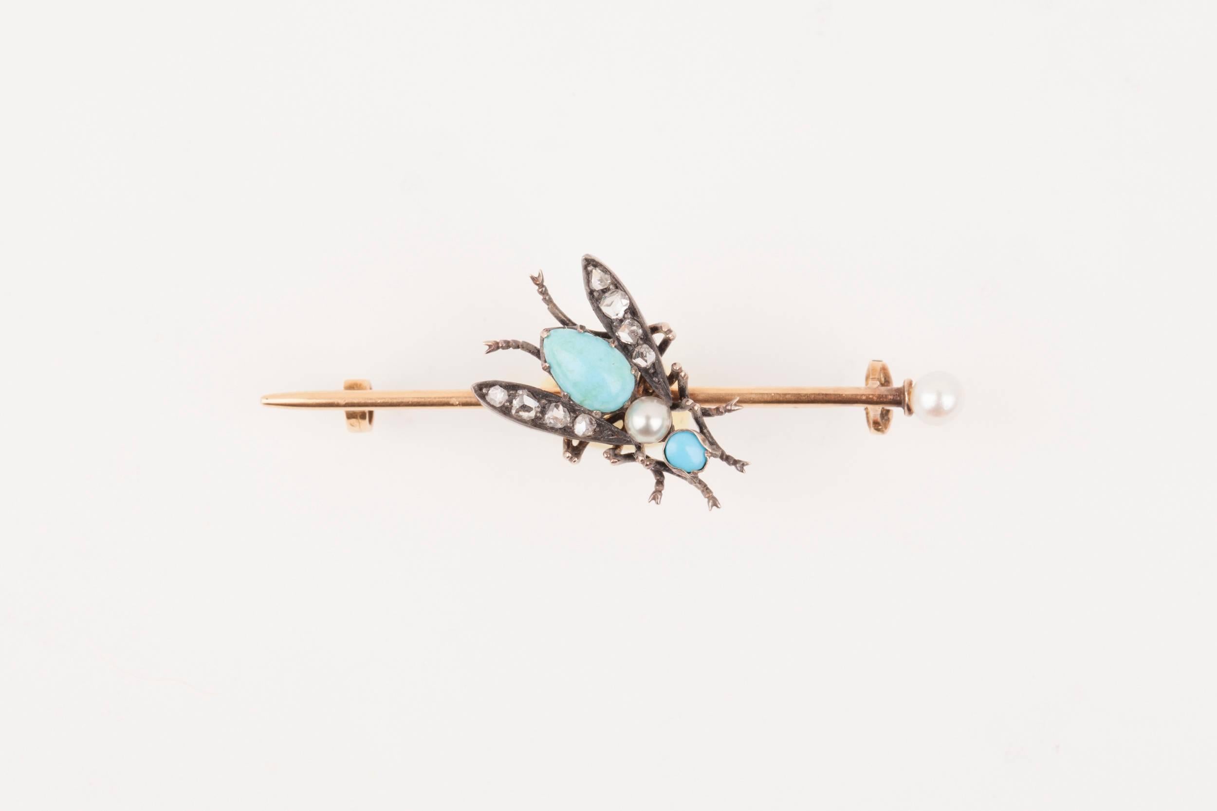 Beautiful barrette brooch, french made circa 1860. 
Gold 18K and silver, set with turquoises, rose cut diamonds and natural pearls.
Weight: 4.40 grams
Dimensions: 5*2 cm
