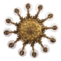 French Victorian Gilt Brass 12-Light Chandelier, Unusual "Green Man" Face Motif