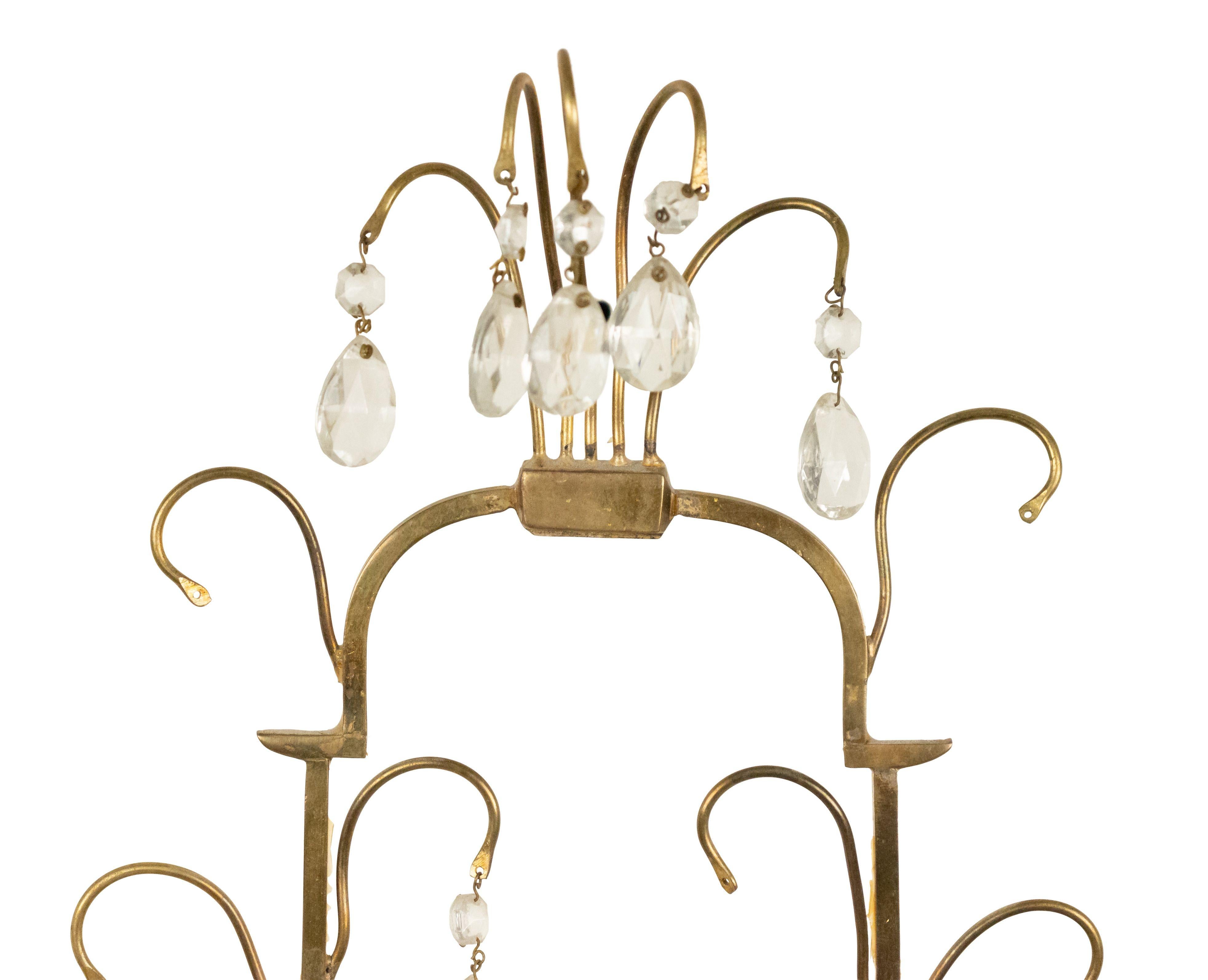 French Victorian 20th century 3 light sconce in gilt bronze with scrolling arms and crystal drops and swags.
