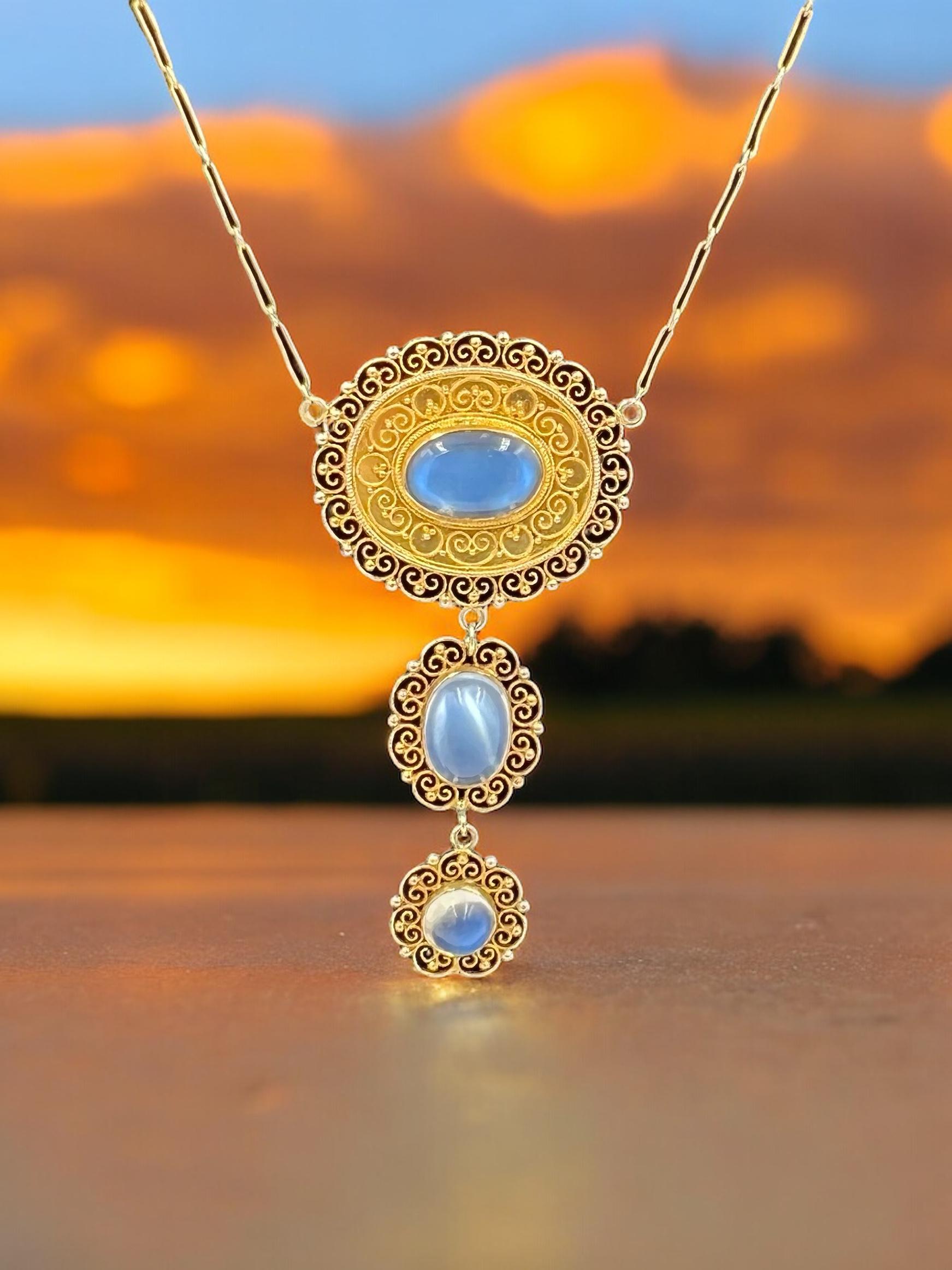 French Victorian three-drop moonstone yellow gold necklace, circa 1890.

The French Victorian Moonstone Yellow Gold Necklace is a stunning piece of jewelry that embodies the elegance and sophistication of the Victorian era. Crafted with meticulous