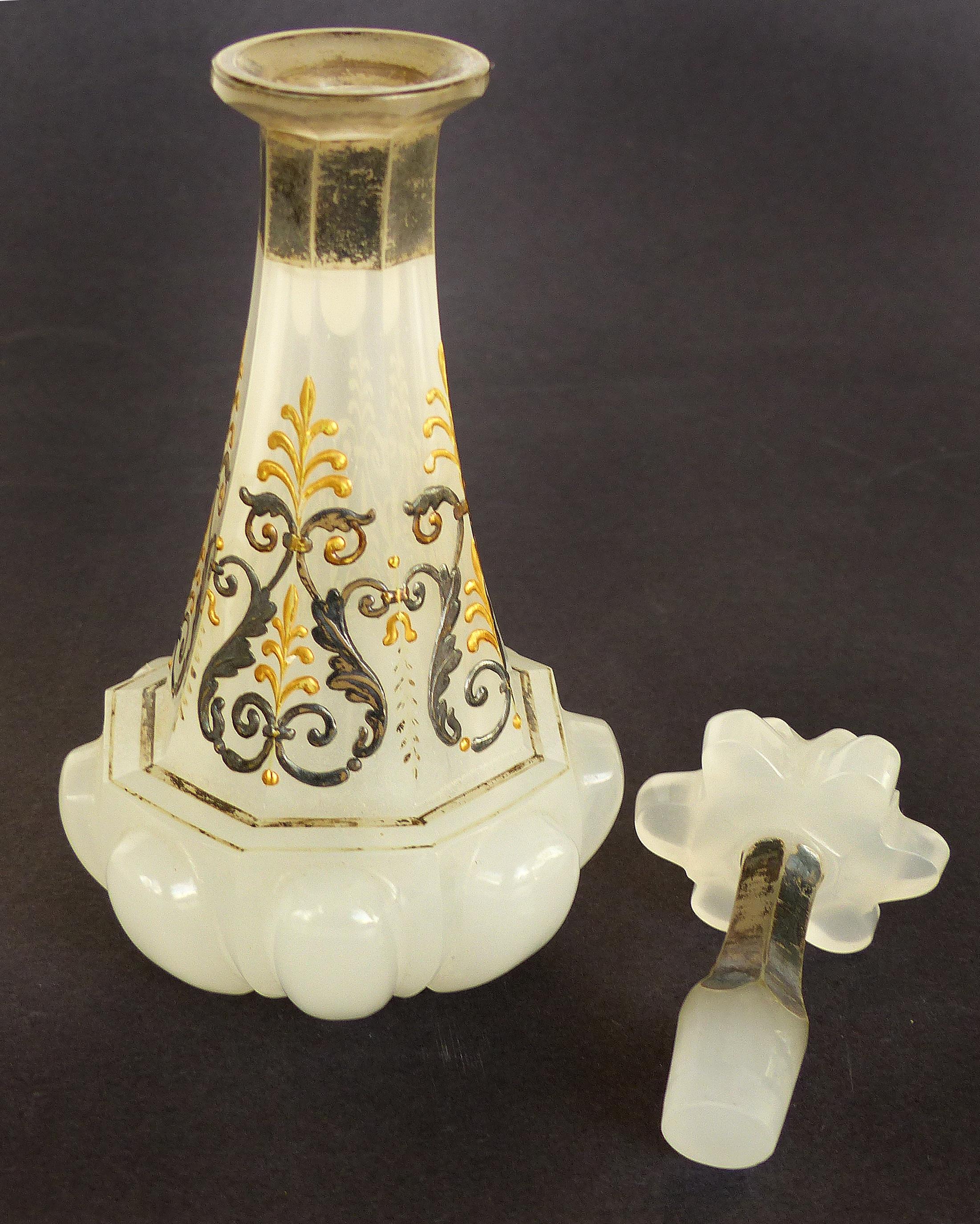 French Victorian Opaline Glass Enameled Scent Bottle with Stopper

Offered for sale is a fine quality French Victorian opaline glass scent bottle with raised enameled decoration and it's the original stopper. This beautifully shaped bottle is from a