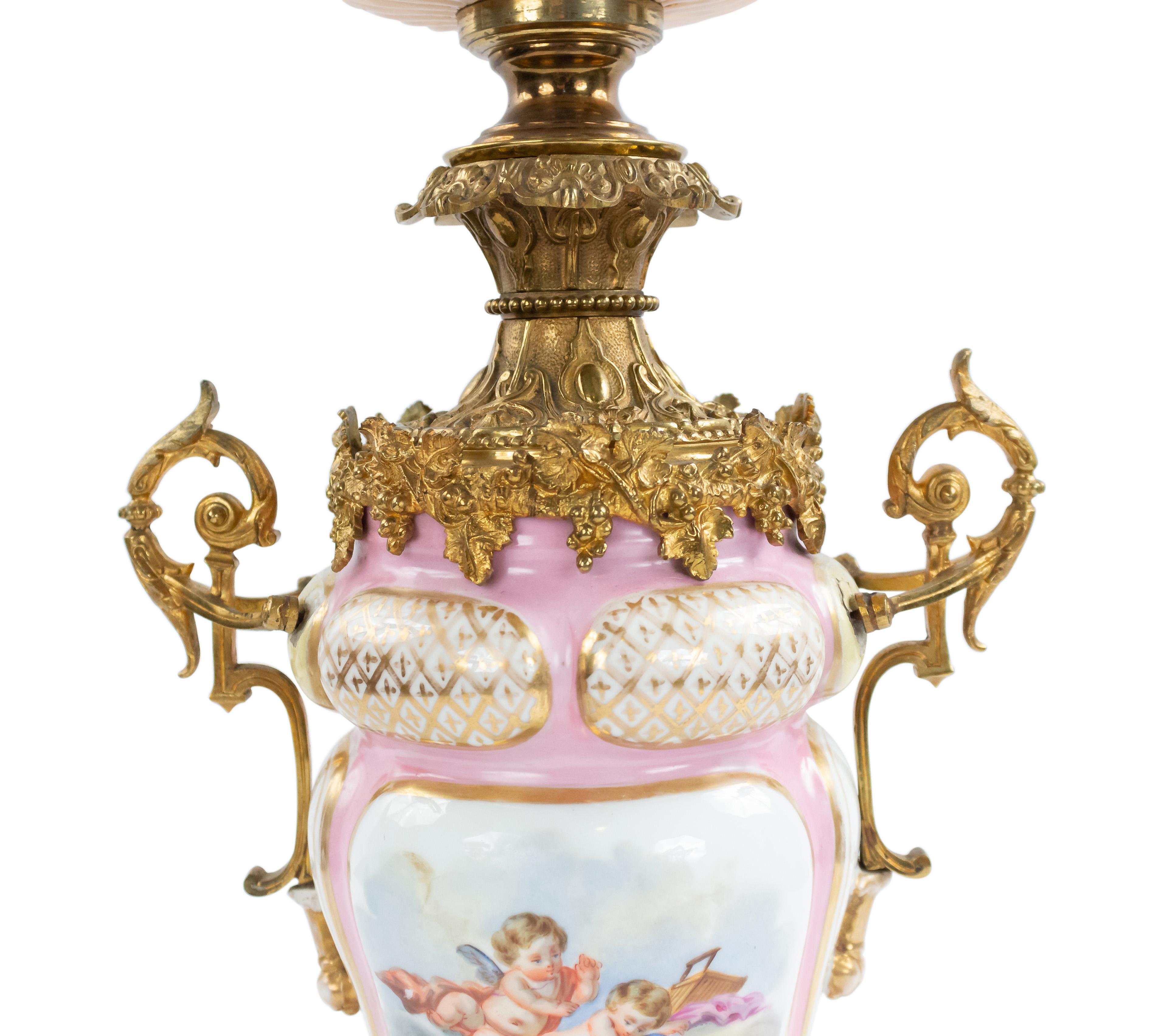 Pair of French Victorian Pink Sevres Porcelain Oil Lamps In Fair Condition For Sale In New York, NY