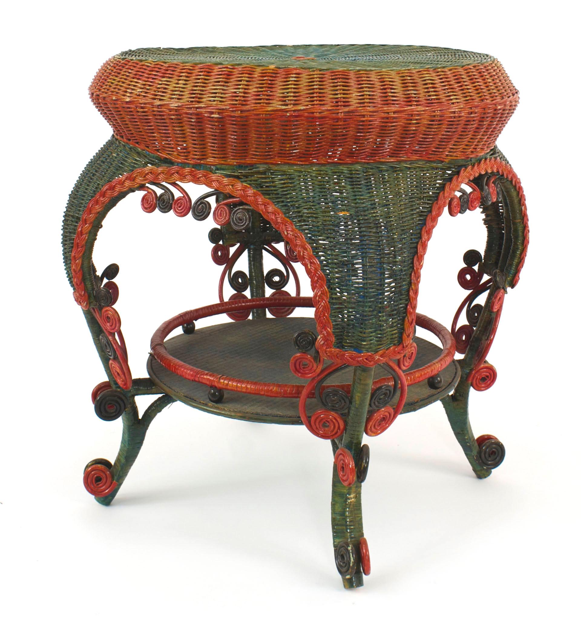 French Victorian red and green painted wicker round end table with scroll design and shelf and gallery.
