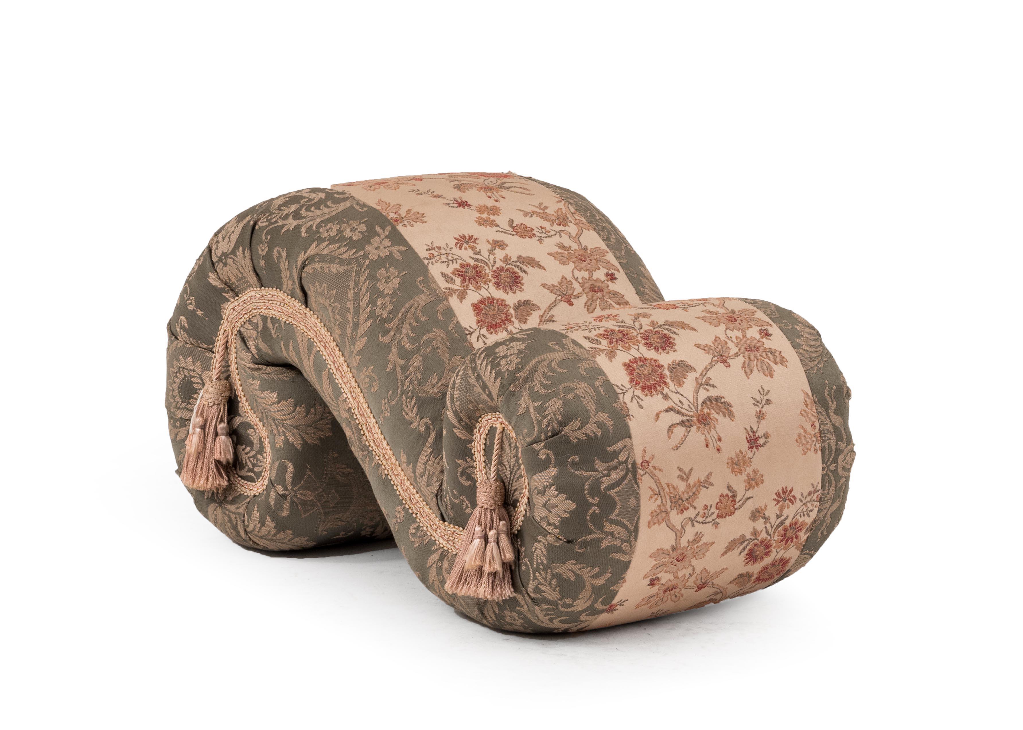 French Victorian scroll shaped foot stool with green damask upholstery.