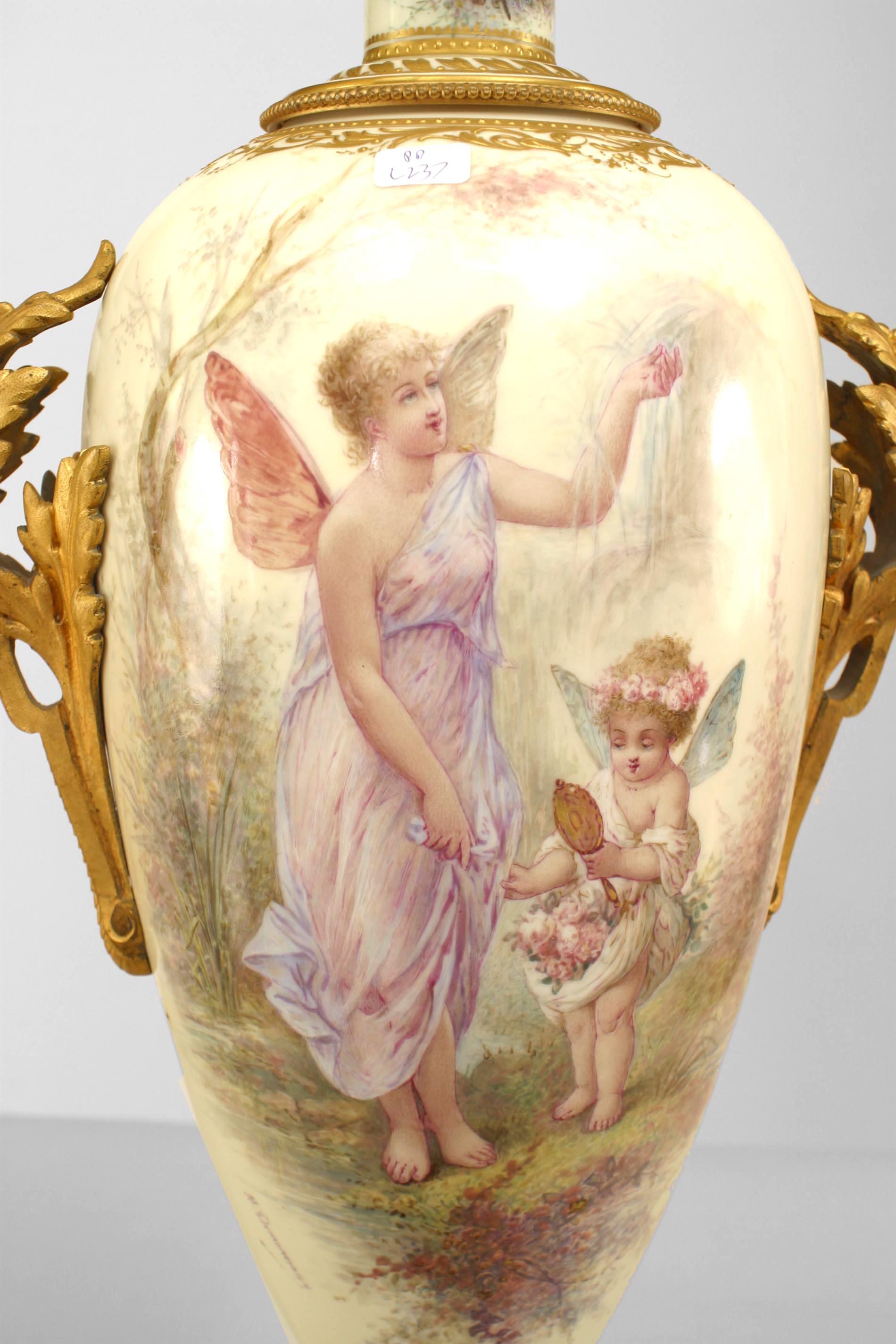 French Victorian (19th Century) S√®vres porcelain lamp with figural angel group mounted on a square bronze base with handles. (signed M. Demoreceaux).
