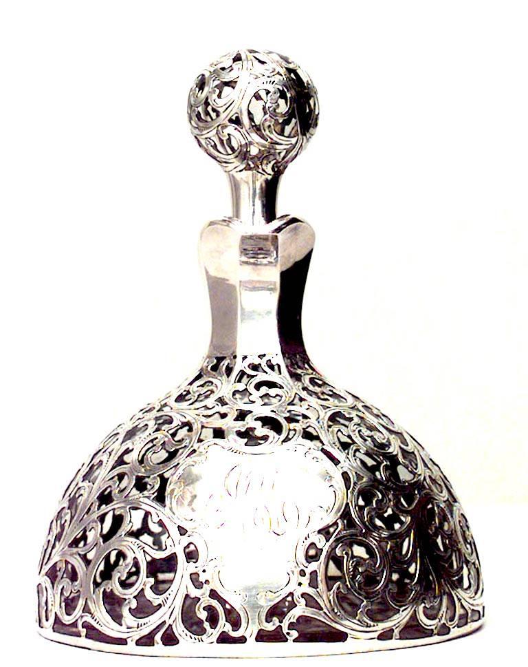 French Victorian silver deposit scroll design decanter with handle and stopper.
