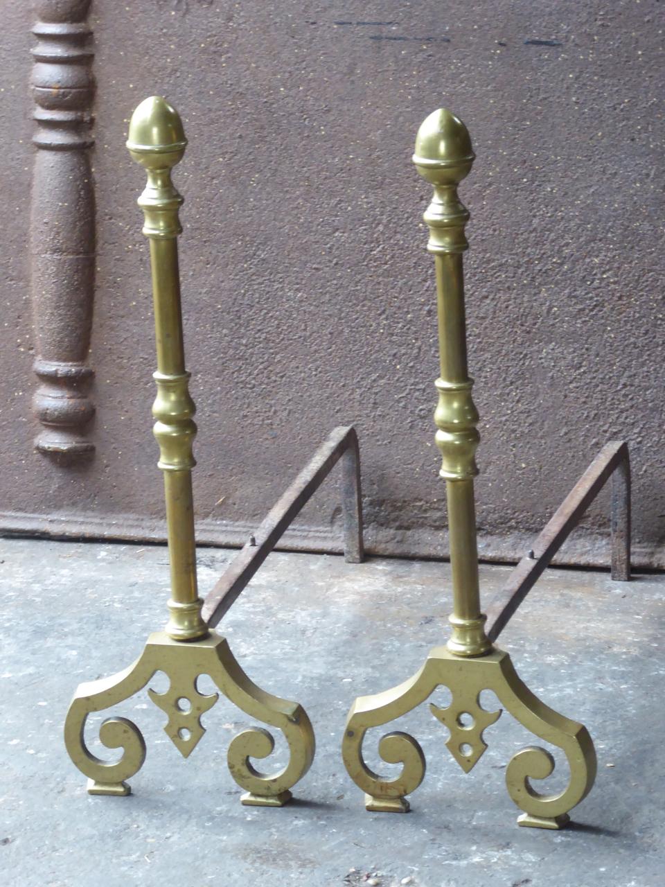 French Victorian style andirons made of brass and wrought iron.







 