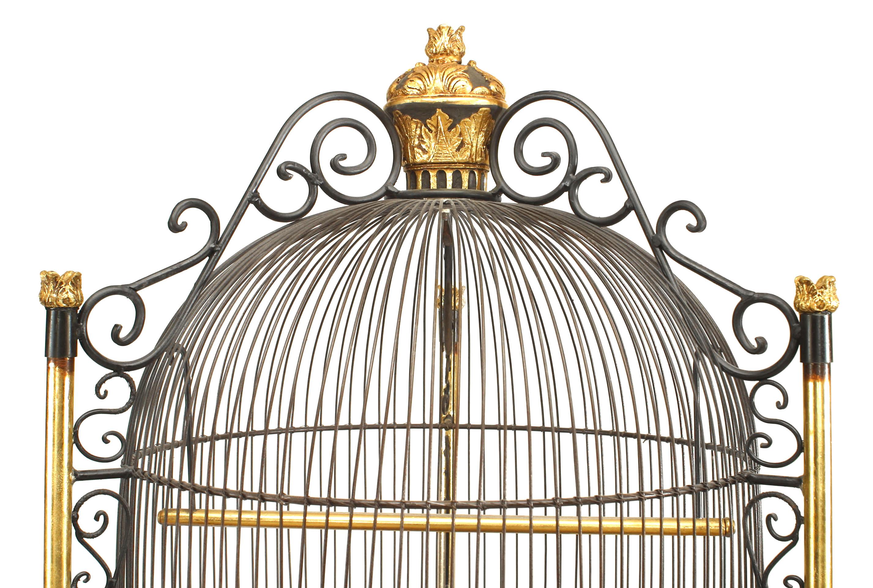 French Victorian style (20th Cent) black iron dome form bird cage supported on tripod base with 2 scroll design stretchers.
 