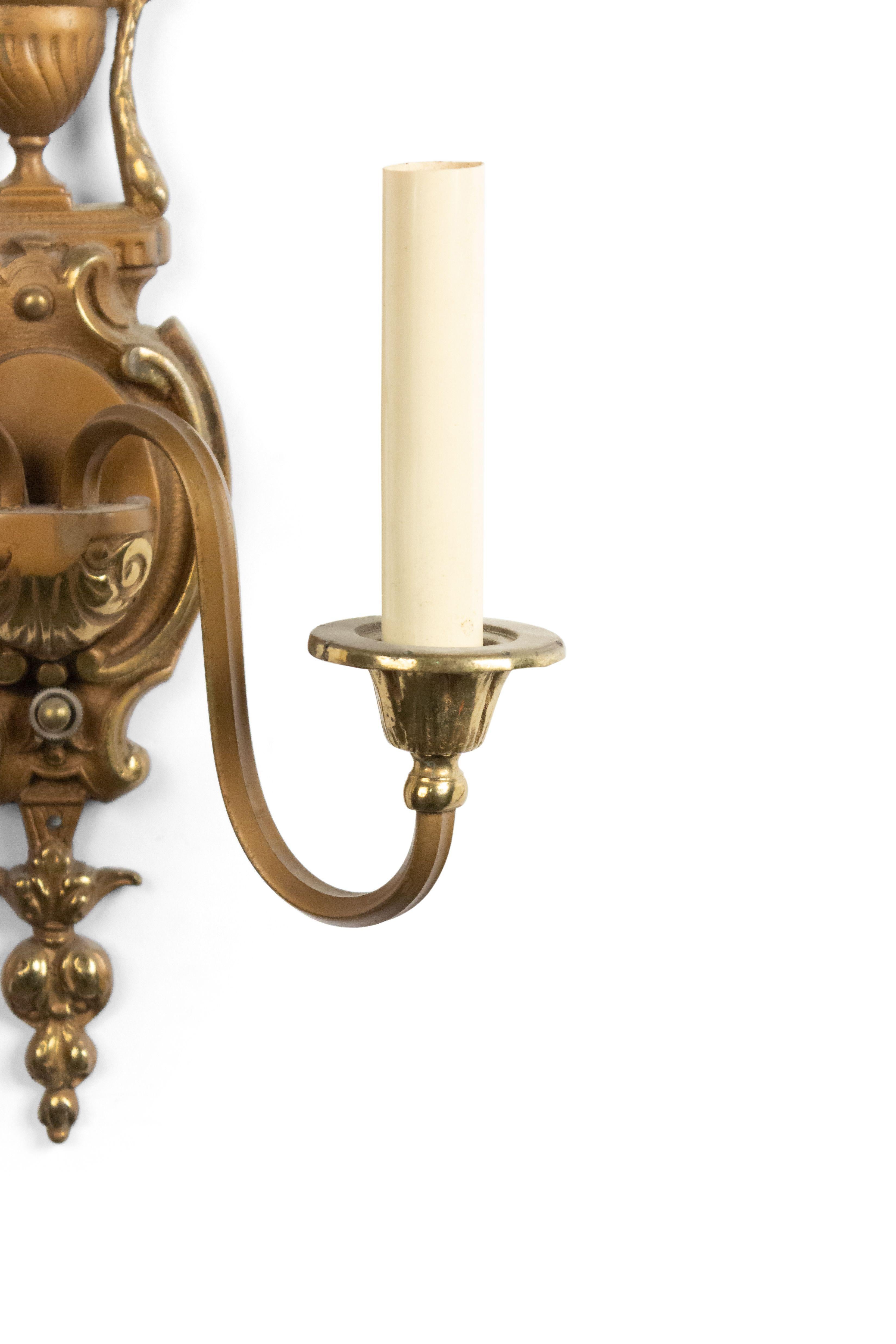 Pair of French Victorian style 19th-20th century bronze and copper patina 2-arm wall sconces with urn top.