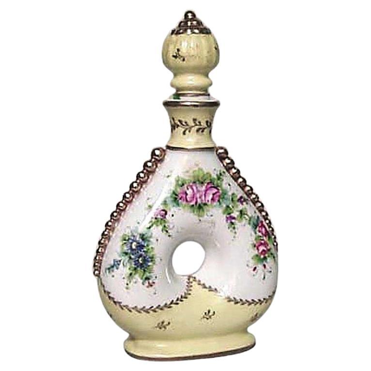 French Victorian style white-and-yellow porcelain shaped perfume bottles