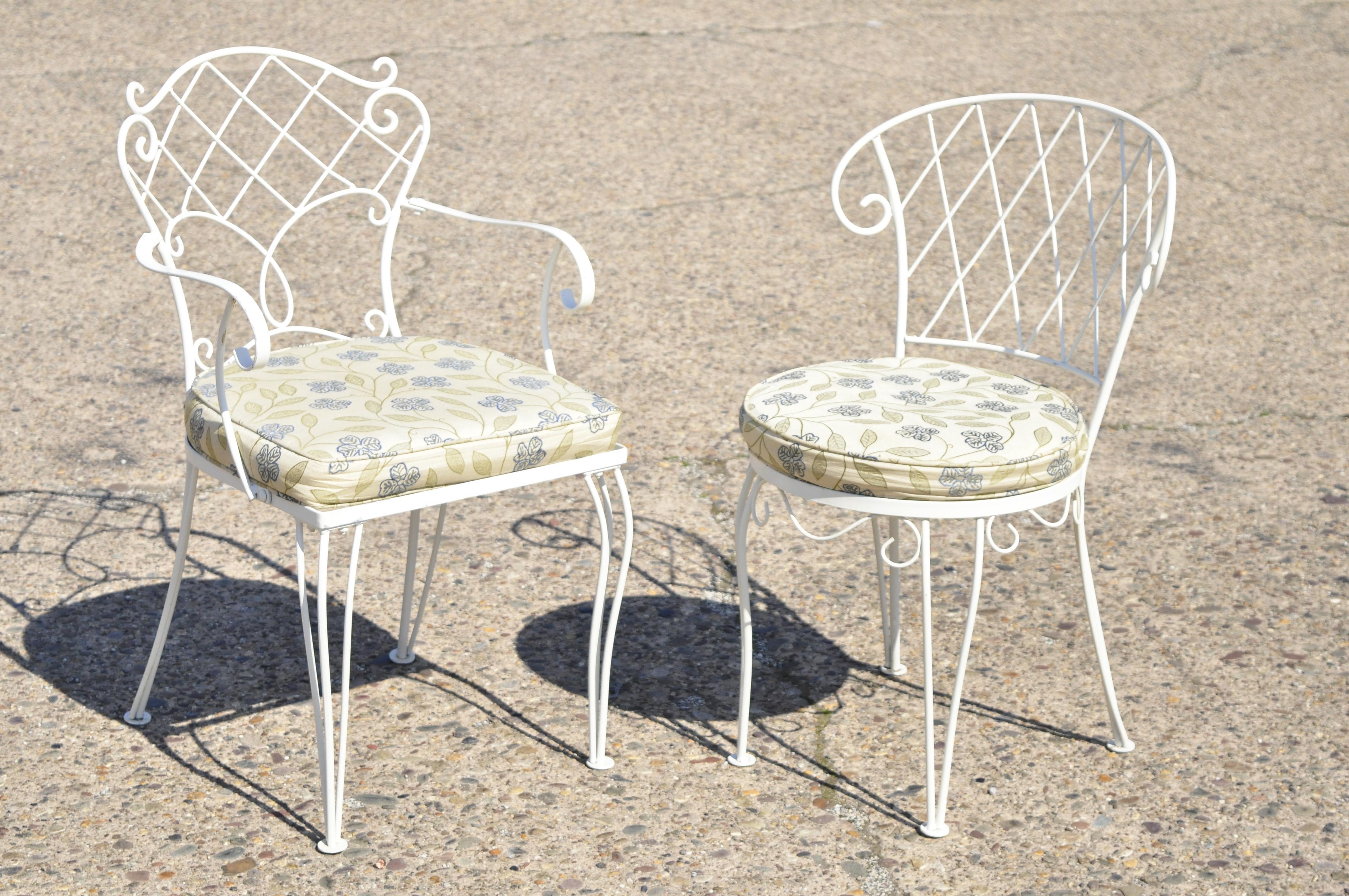 vintage white wrought iron table and chairs