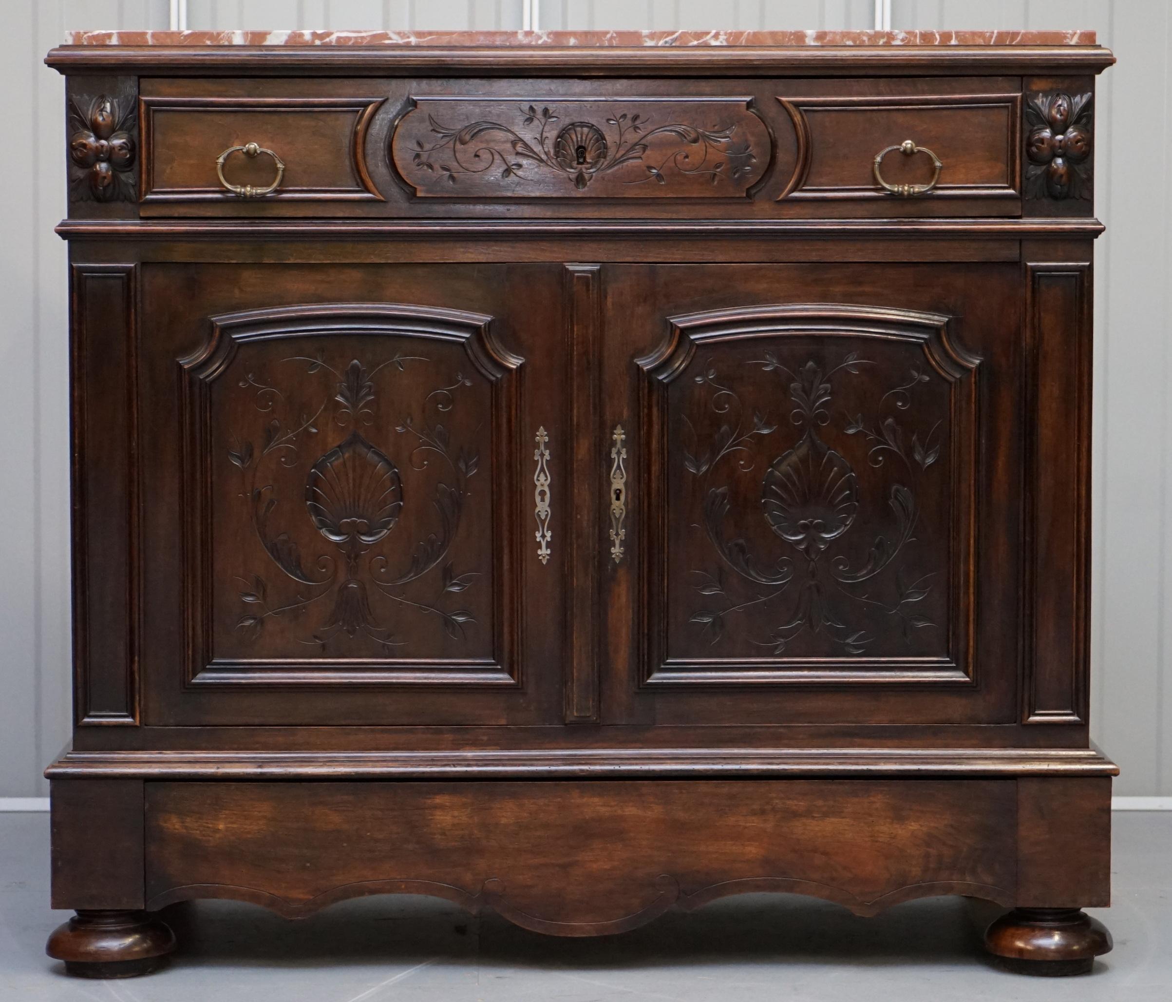 We are delighted to offer for sale this absolutely stunning original Victorian walnut with satinwood drawers and marble top sideboard with extra hidden silverware drawer

A very versatile and good looking piece. Its like a sideboard but has linen