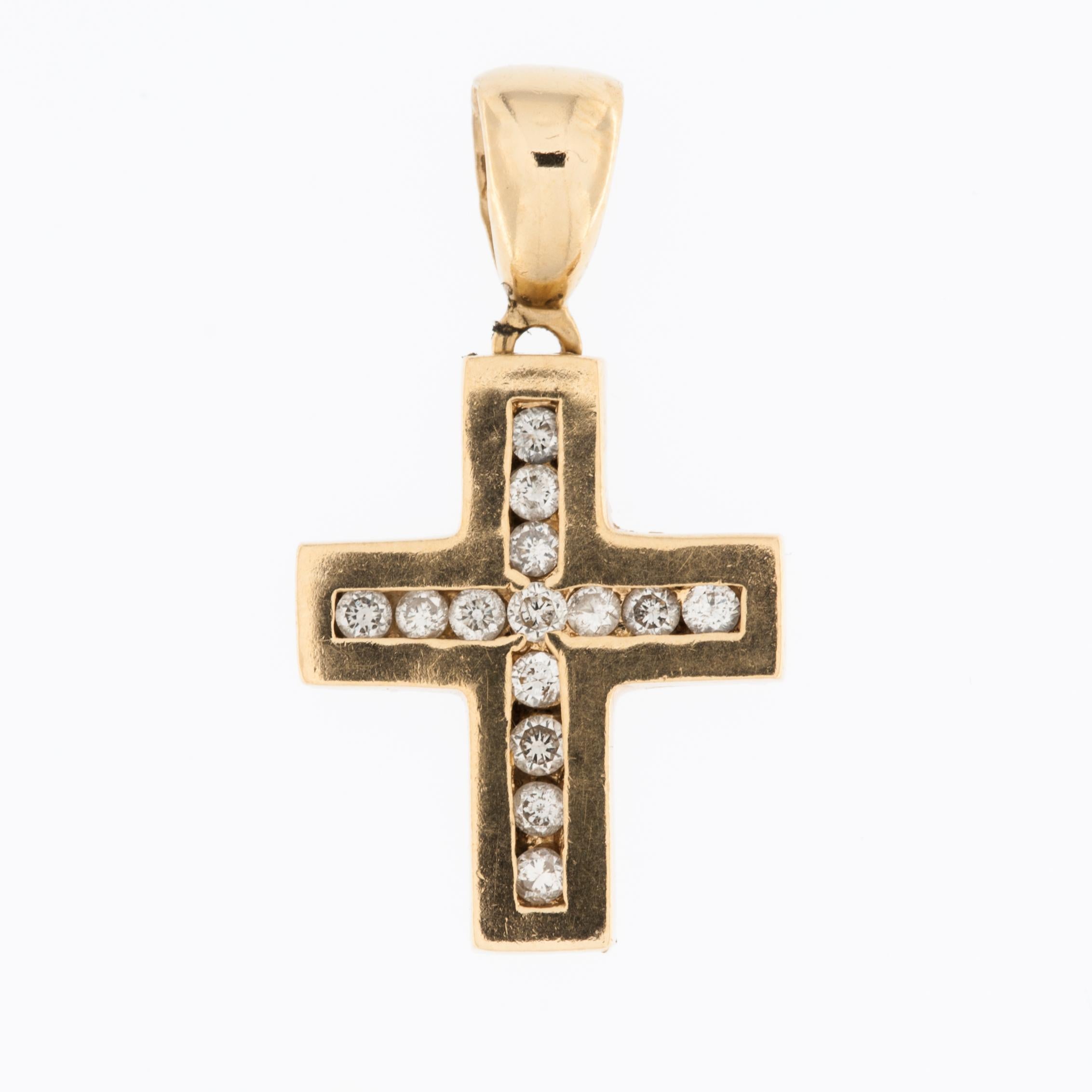 The French Vintage 18kt Yellow Gold Cross with Diamonds is a beautiful piece of jewelry that exudes elegance and timeless charm.

This cross pendant is crafted from 18-karat yellow gold, which is known for its rich and warm color. The use of