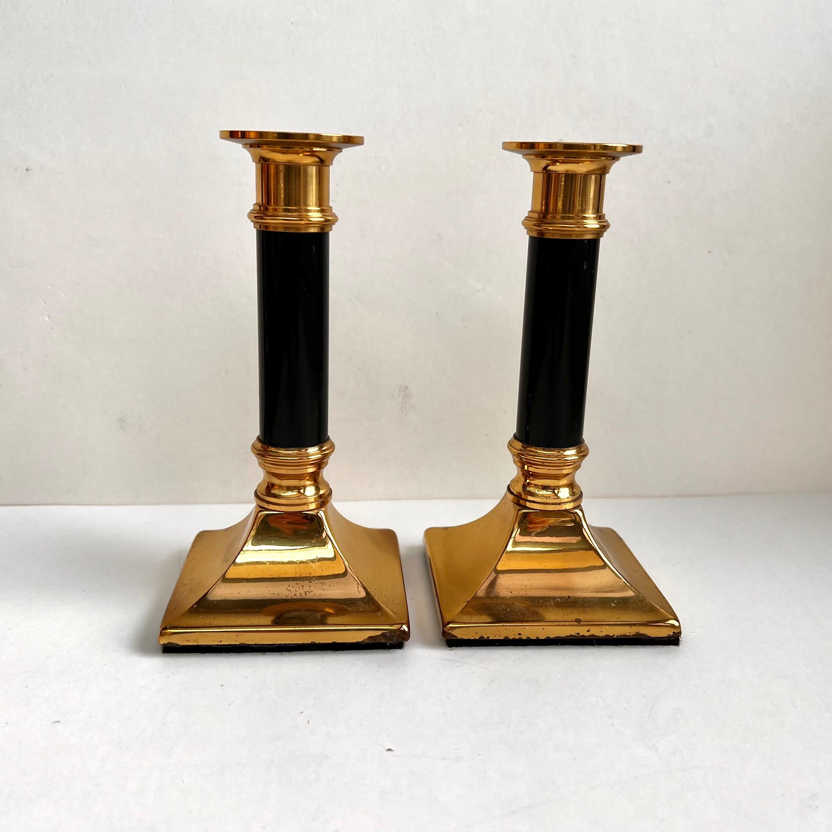 Original Vintage Set of 2 Candlesticks made of gilt brass. 

Manufactured in France, 1970s.

Candlesticks will decorate the interior and serve as an elegant stand for a table candle. 

The product is made of high-quality brass characterized by