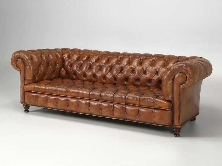 The owner’ s of Old Plank have for decades strived to find the finest examples of old leather furniture. Whether it’ s French leather club chairs, or Chesterfield sofas. Two things stand out on this particular old leather Chesterfield sofa and that