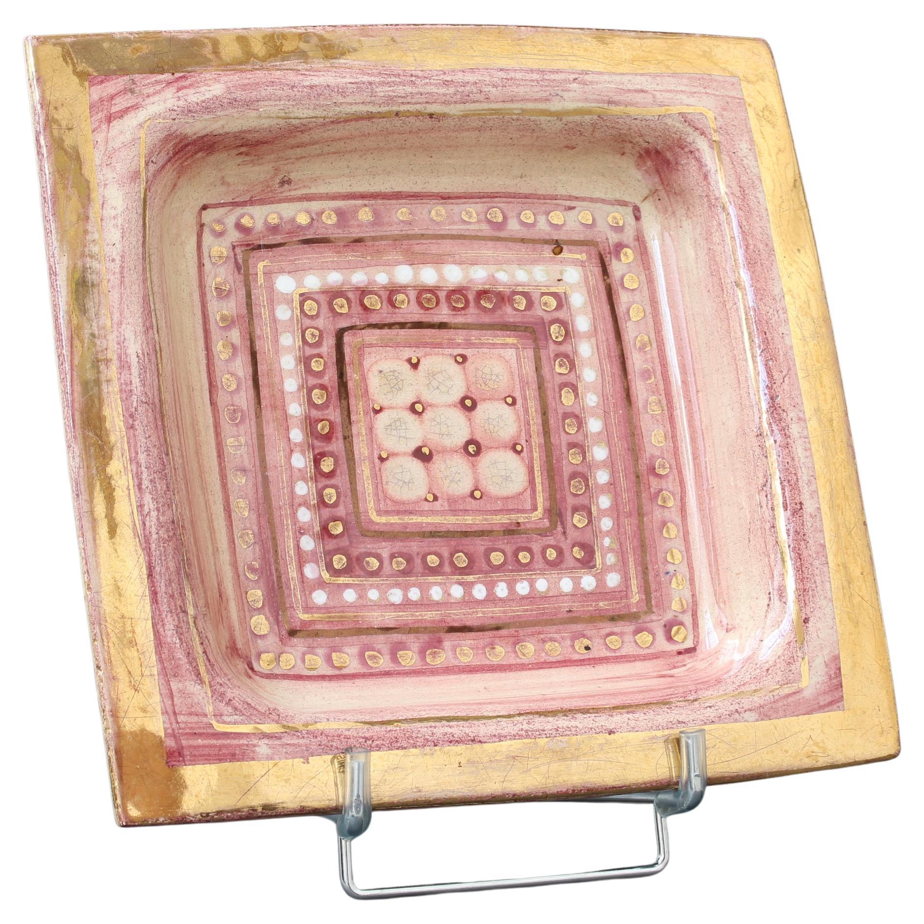 French vintage decorative tray / vide-poche by ceramicist Georges Pelletier (circa 1970s). Hand painted, large ceramic tray also suitable for wall hanging. The piece has brushed, rose-coloured highlights and gold-lustre edging. The sunken base of