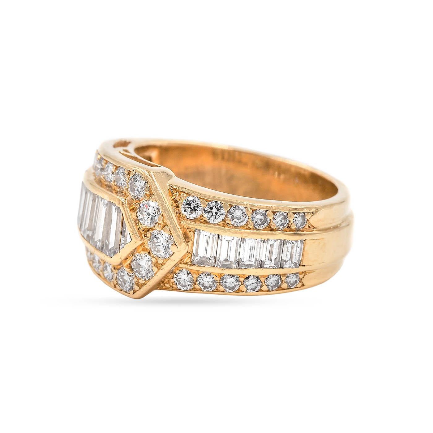 A Vintage Diamond Buckle Ring composed of 18k yellow gold. Featuring rectangular Step Cut and Brilliant Cut diamonds, as well as one triangular Step Cut diamond (50 diamonds in total). Diamonds weigh approximately 2.10 carats in total, estimated G-H