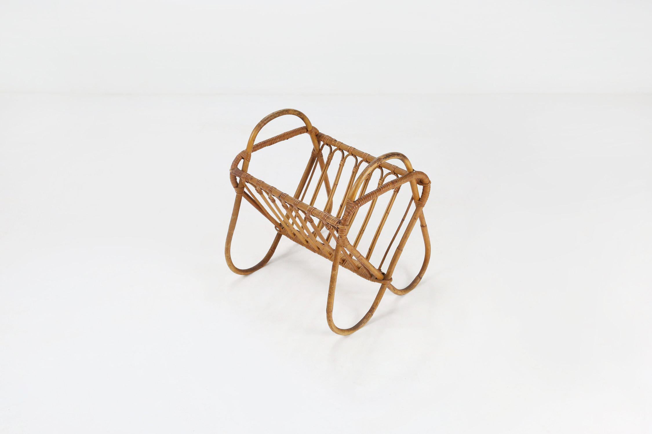 France / 1950 / magazine rack / rattan / vintage / Mid-Century

Nice Vintage magazine rack made in the 1950s. Beautiful designed rattan and bamboo rack with plenty of space for your beloved magazines. Great authentic bohemian item.  

This charming