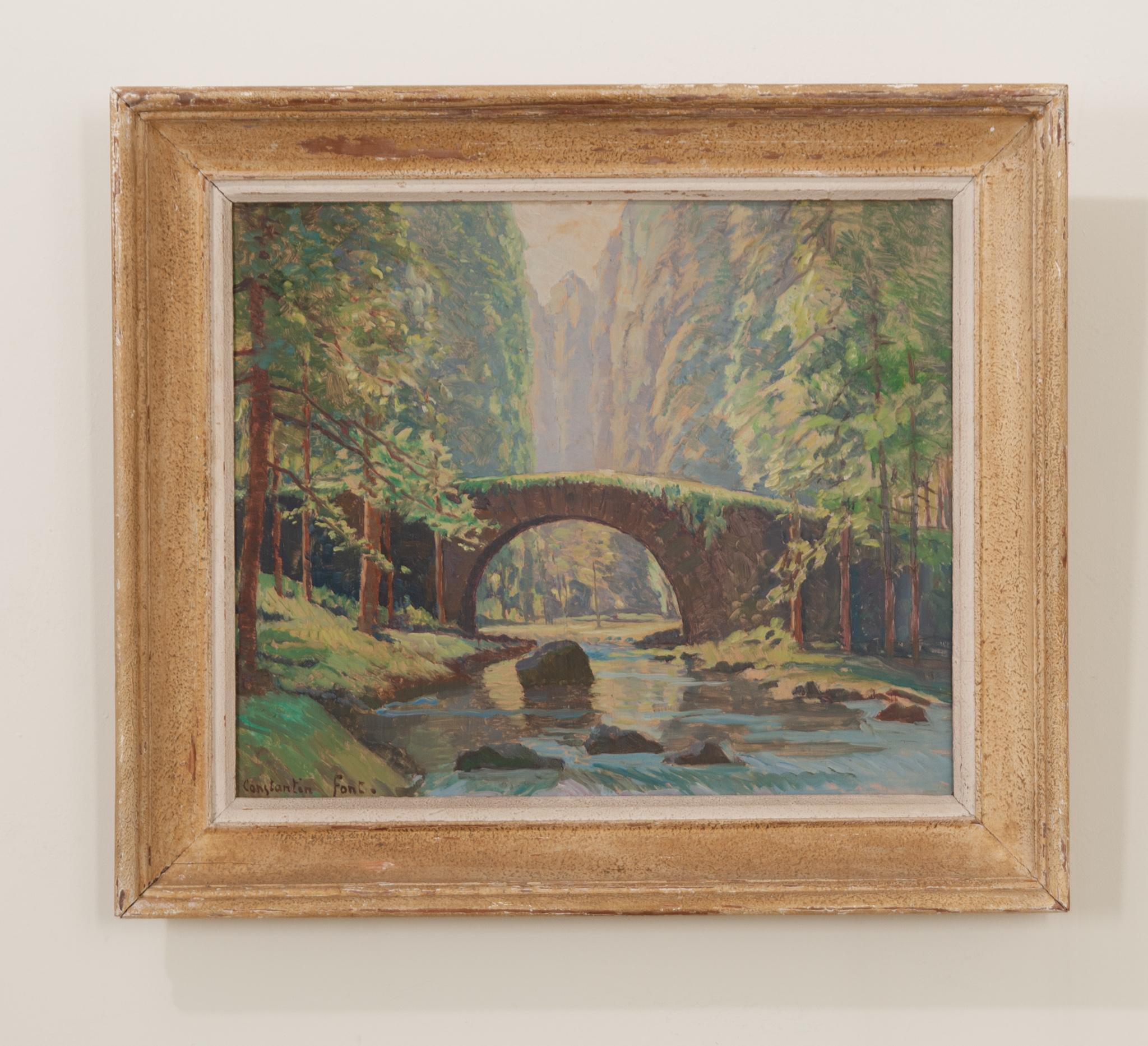 Oil on artist board of a vibrant, idyllic landscape scene from France. Worn painted frame is fixed with a hanging wire. Signed by the artist Constantin Font (1890-1954) in the bottom left hand corner. A sticker on the backside lists the placement of